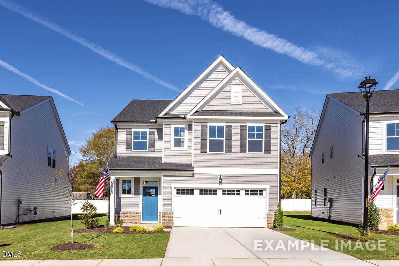 Two-story Adalynn A floor plan by Davidson Homes with a 2-car garage in Woodland Crossing, Zebulon, North Carolina.