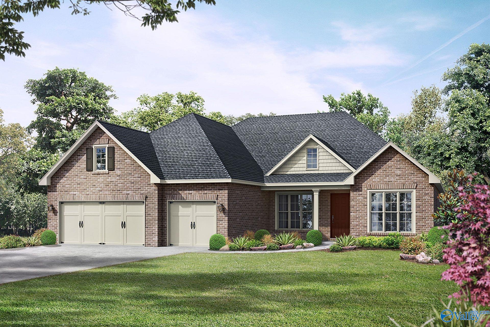 The Finleigh 5-bedroom brick home with 3-car garage, gabled roof, and landscaped yard by Davidson Homes in Hollon Meadow, Decatur, Alabama