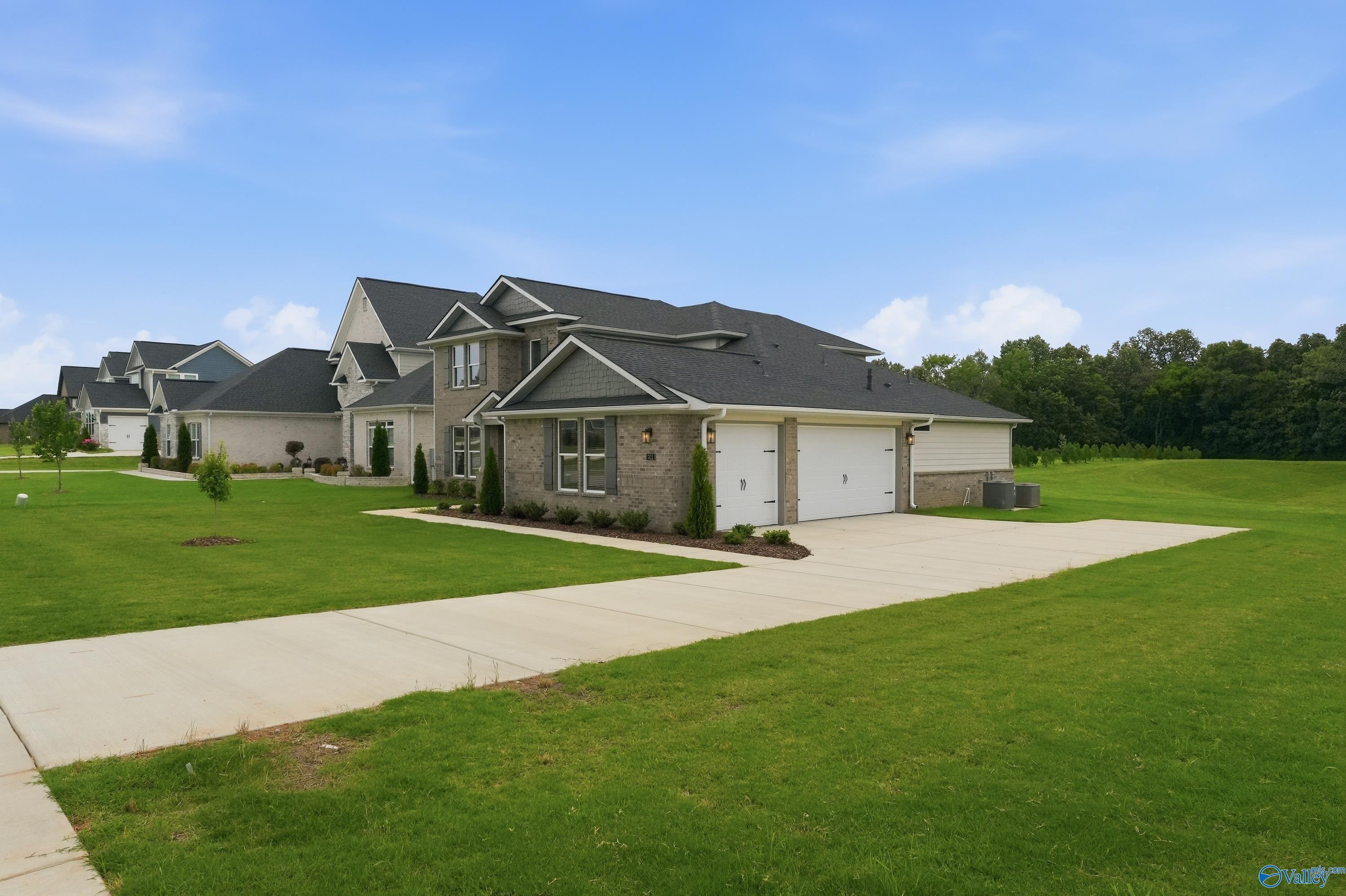 Two-story Dorado floor plan by Davidson Homes with a 3-car garage in Riverton Preserve, Huntsville, Alabama.