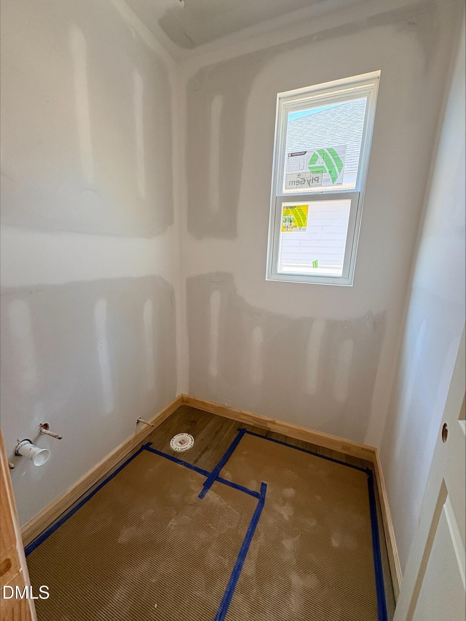 Unfinished bathroom with drywall and plumbing in The Willow B floor plan by Davidson Homes in Zebulon, North Carolina.