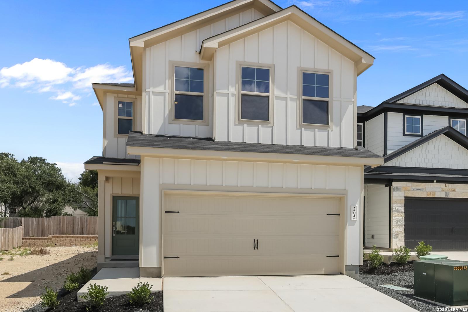 Two-story Gillian C floor plan by Davidson Homes with a two-car garage in Meadows at Oak Creek, San Antonio, Texas.