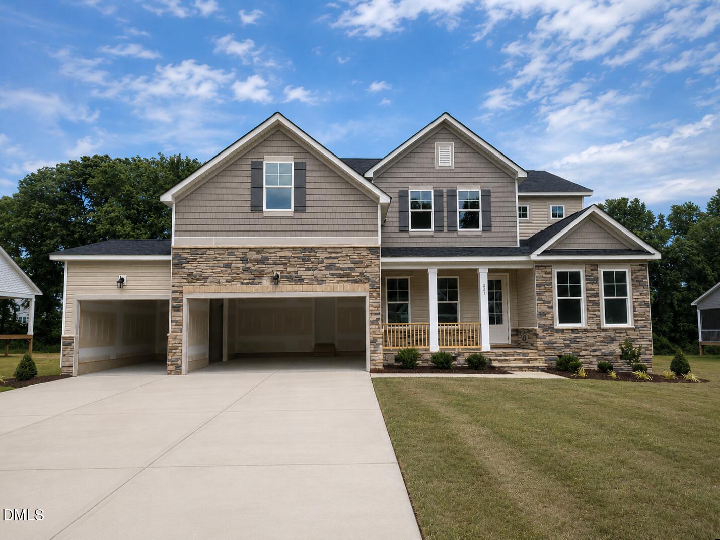 Two-story Davidson Homes Crawford D floor plan with 3-car garage and stone exterior in Tobacco Road, Angier, North Carolina.