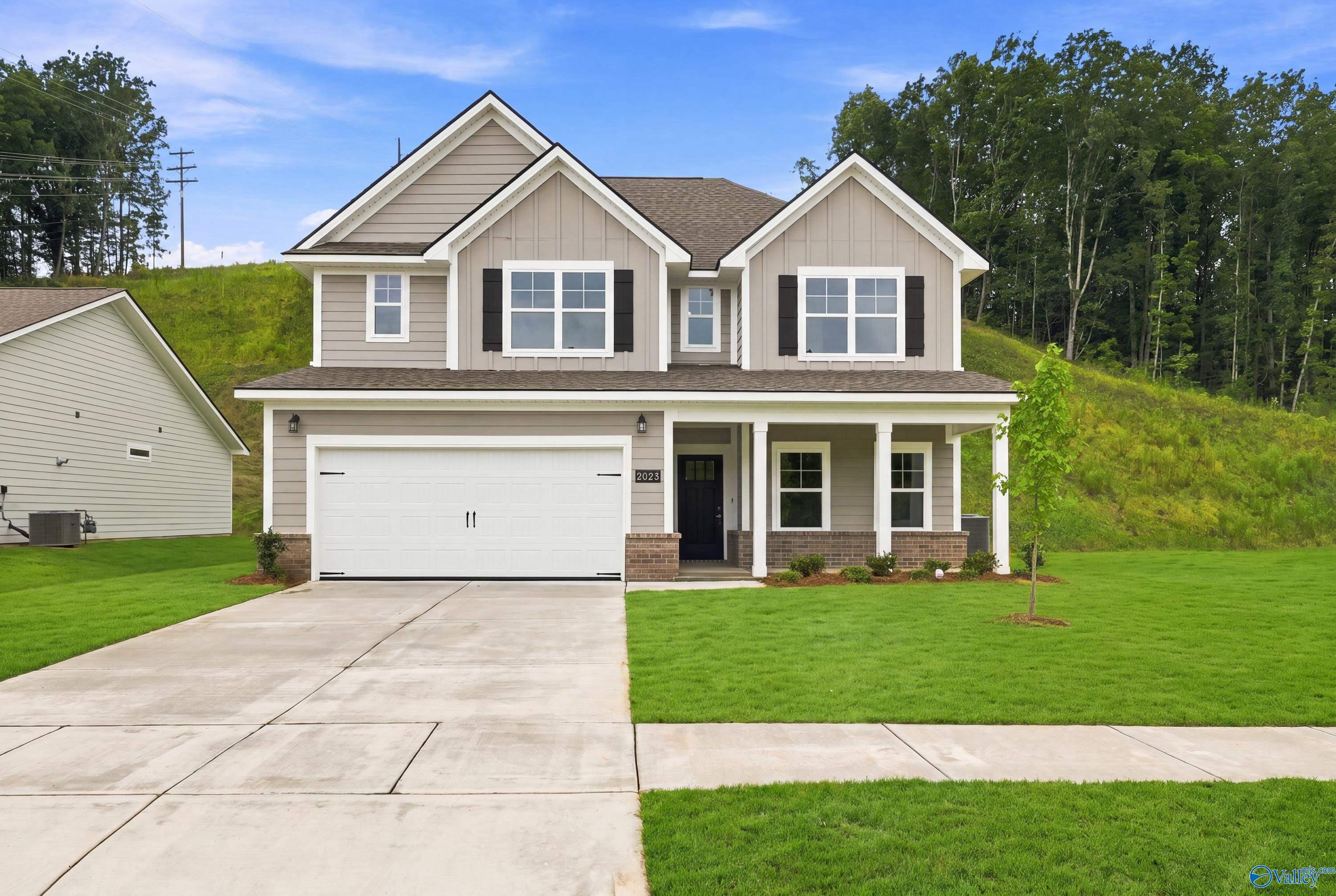 Two-story, 4-bedroom Shelby D floor plan by Davidson Homes with 2-car garage in Noble Ridge, Cullman, Alabama.