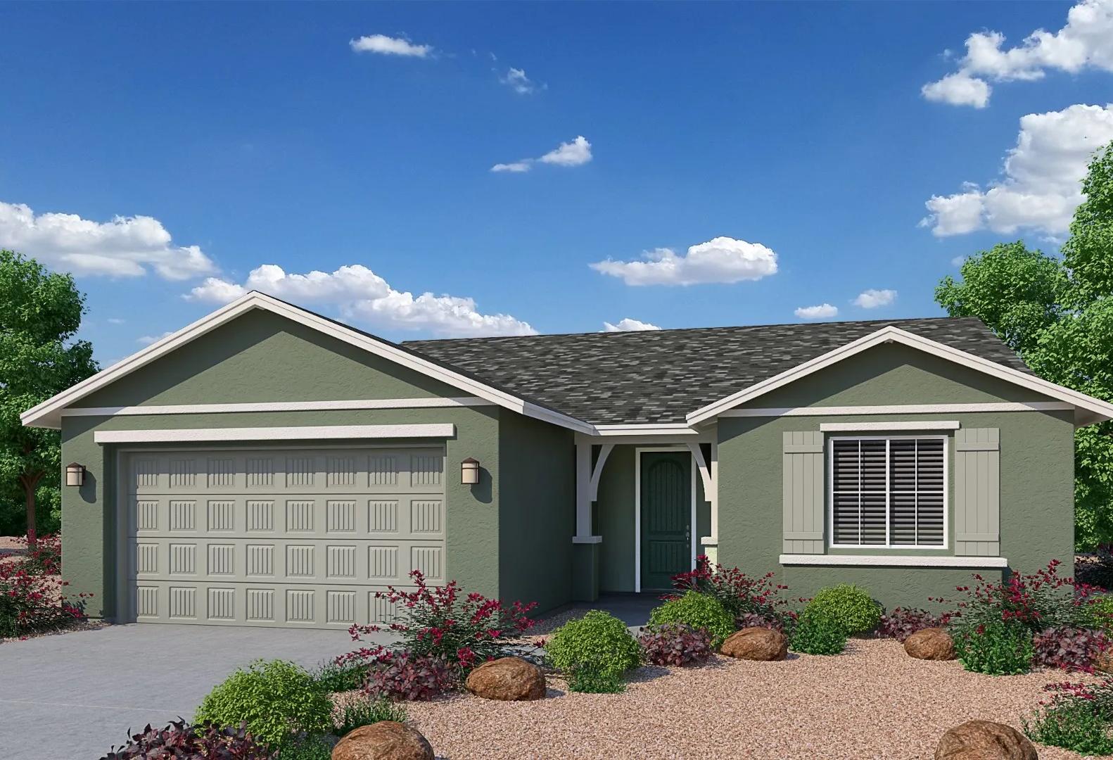 Sage green single-story exterior of The Durango II home featuring 3-car garage, desert landscaping, and blue skies in Prescott, Arizona