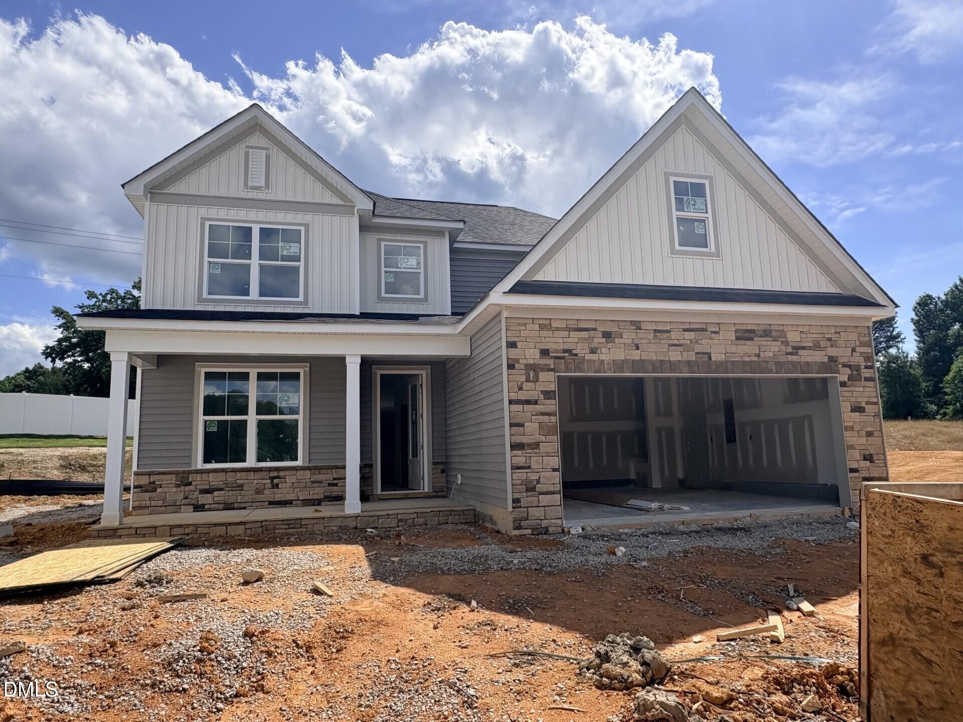 New construction 2-story home by Davidson Homes in Woodland Crossing, Zebulon, NC, featuring The Ash C floor plan.
