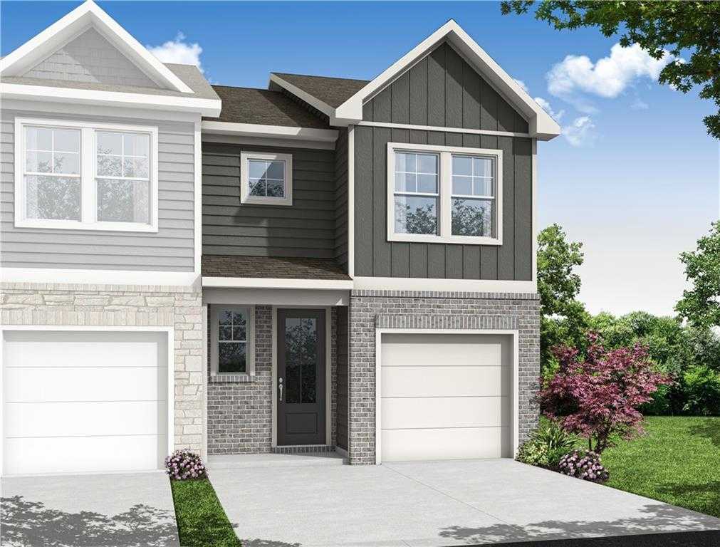 Modern 2-story Durant C home exterior with gray siding, brick accents, one-car garage, and front porch in Stegall Village, Emerson, Georgia