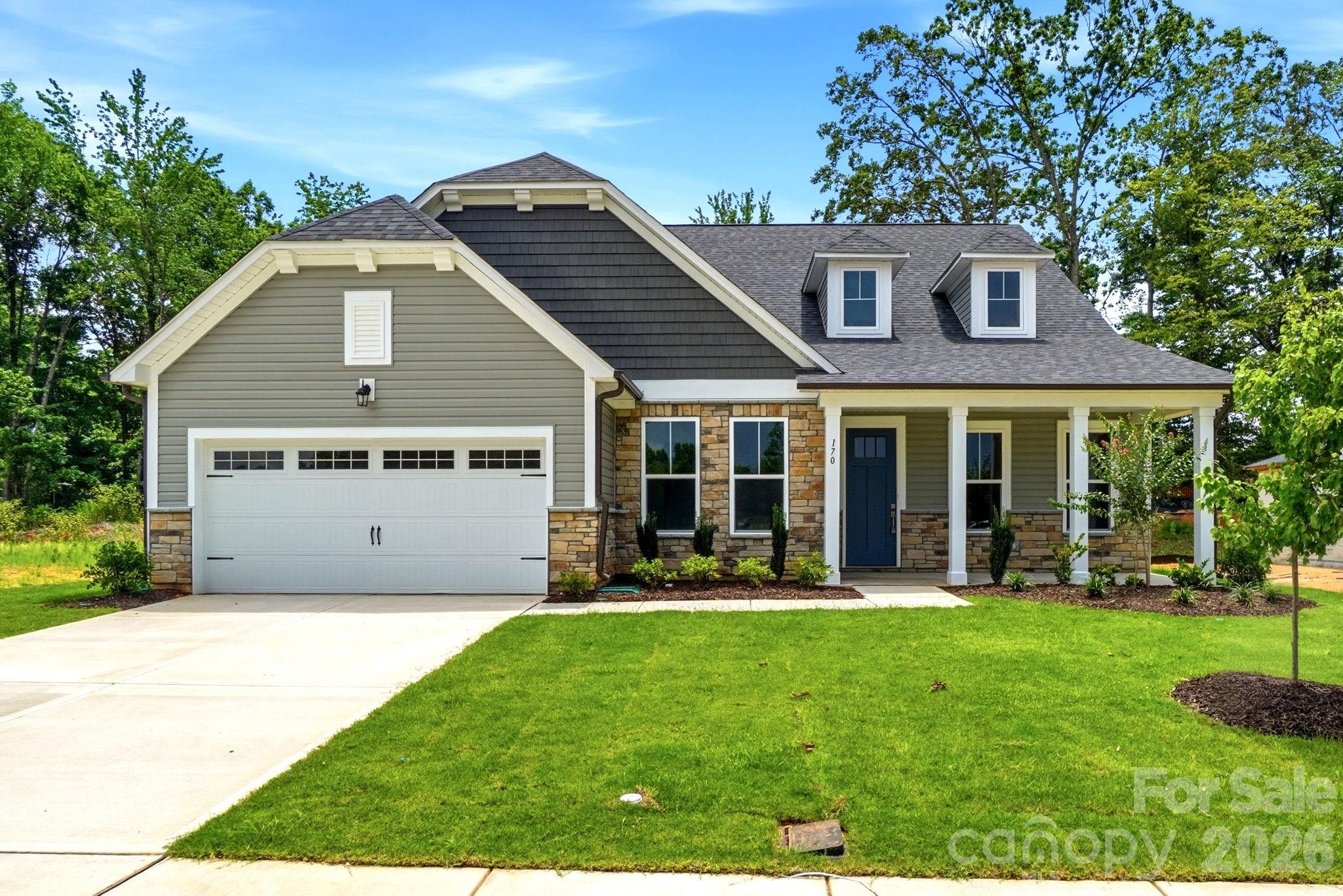 The Magnolia B floor plan by Davidson Homes: 1.5-story, 4-bedroom house with 2-car garage in Windgate, Mooresville, NC.