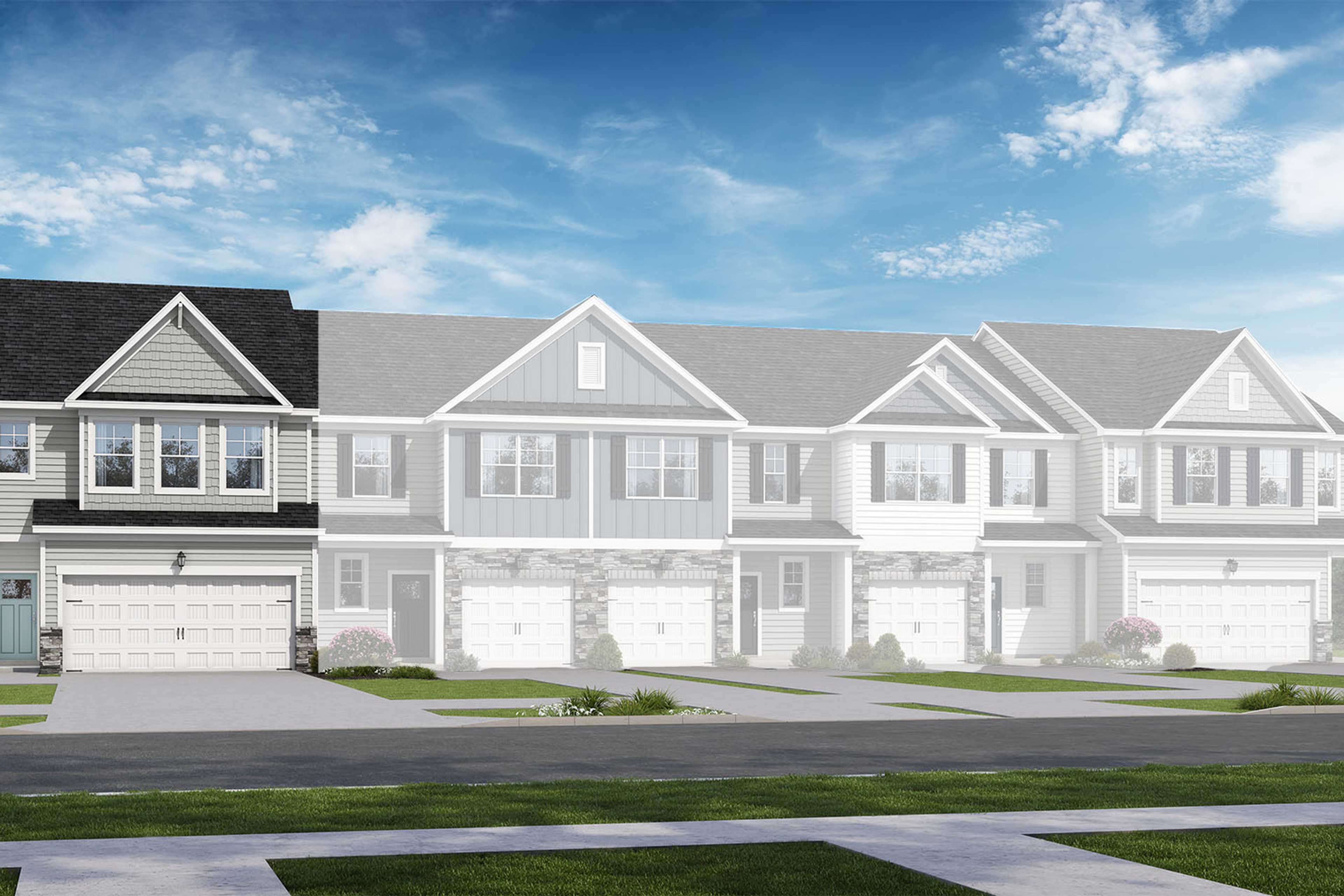 Two-story multi-family townhomes in The Wake design, gray siding exteriors, two-car garages, gabled roofs, blue sky and trees