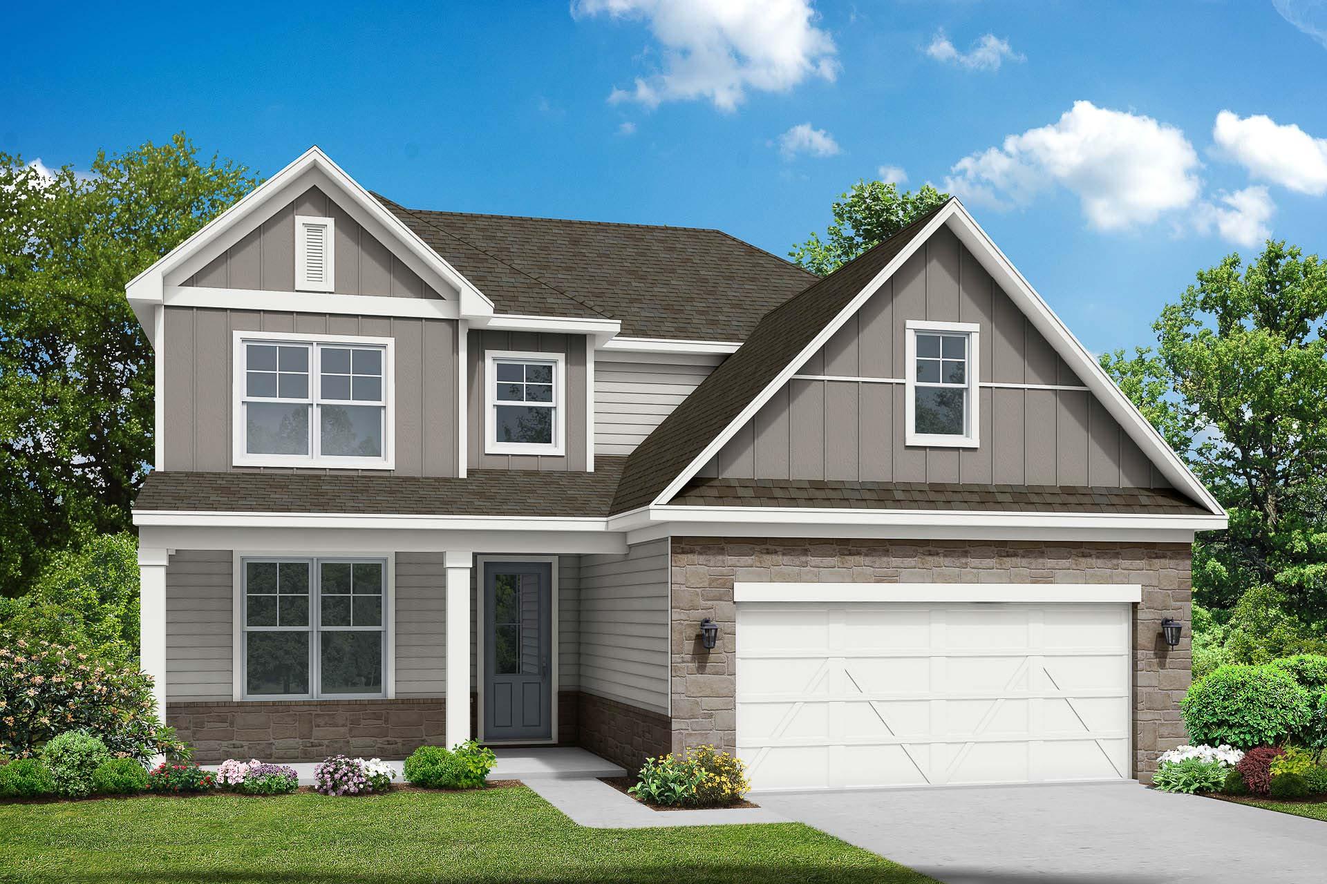 Modern two-story elevation of The Ash C showcasing gray siding, brick base, two-car garage, and lush landscaping