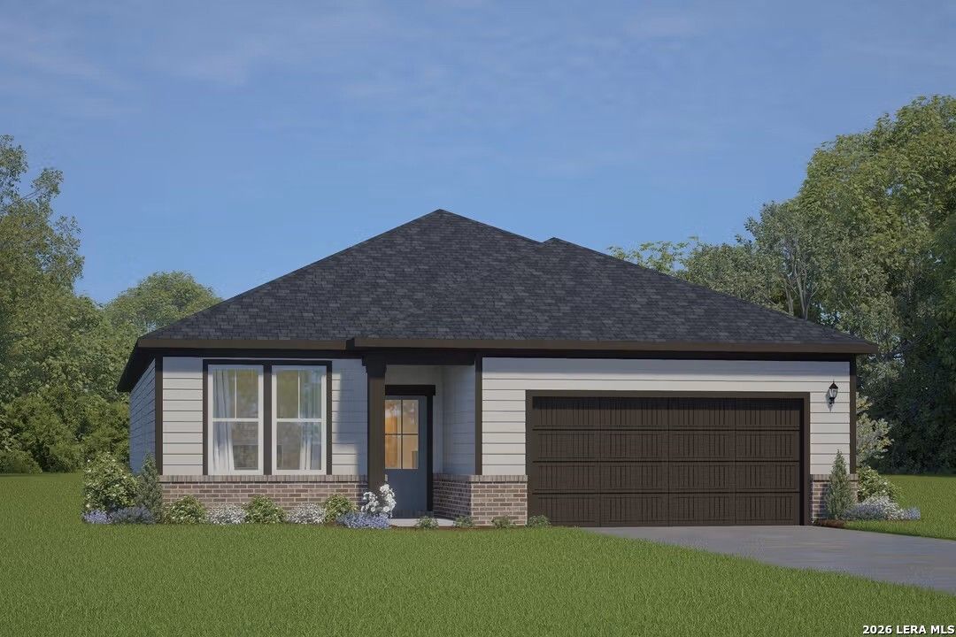 Modern 1-story 3-bed, 2.5-bath home with 2-car garage, brick accents, and lush landscaping in Hickory Ridge, Elmendorf, Texas - Davidson Homes Glenwood D