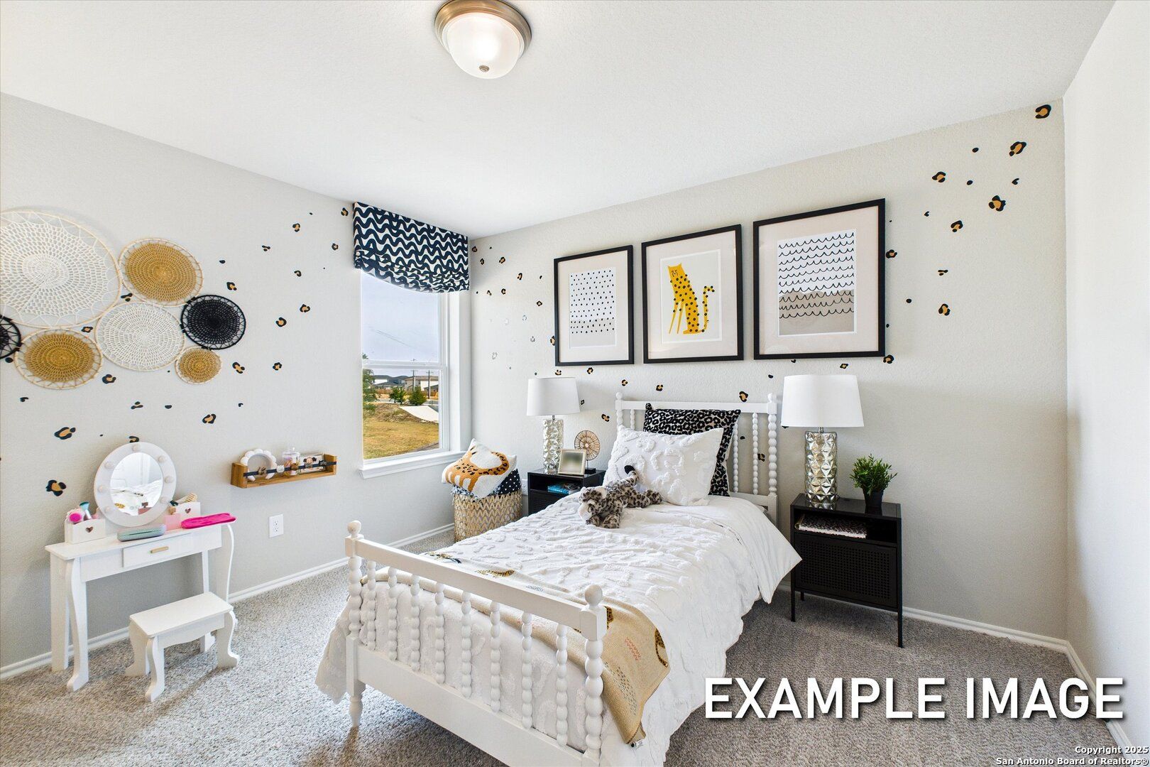 Playful girl's bedroom with white bed, leopard art, vanity desk, and window view in Davidson Homes Sabine C, Agave, San Antonio