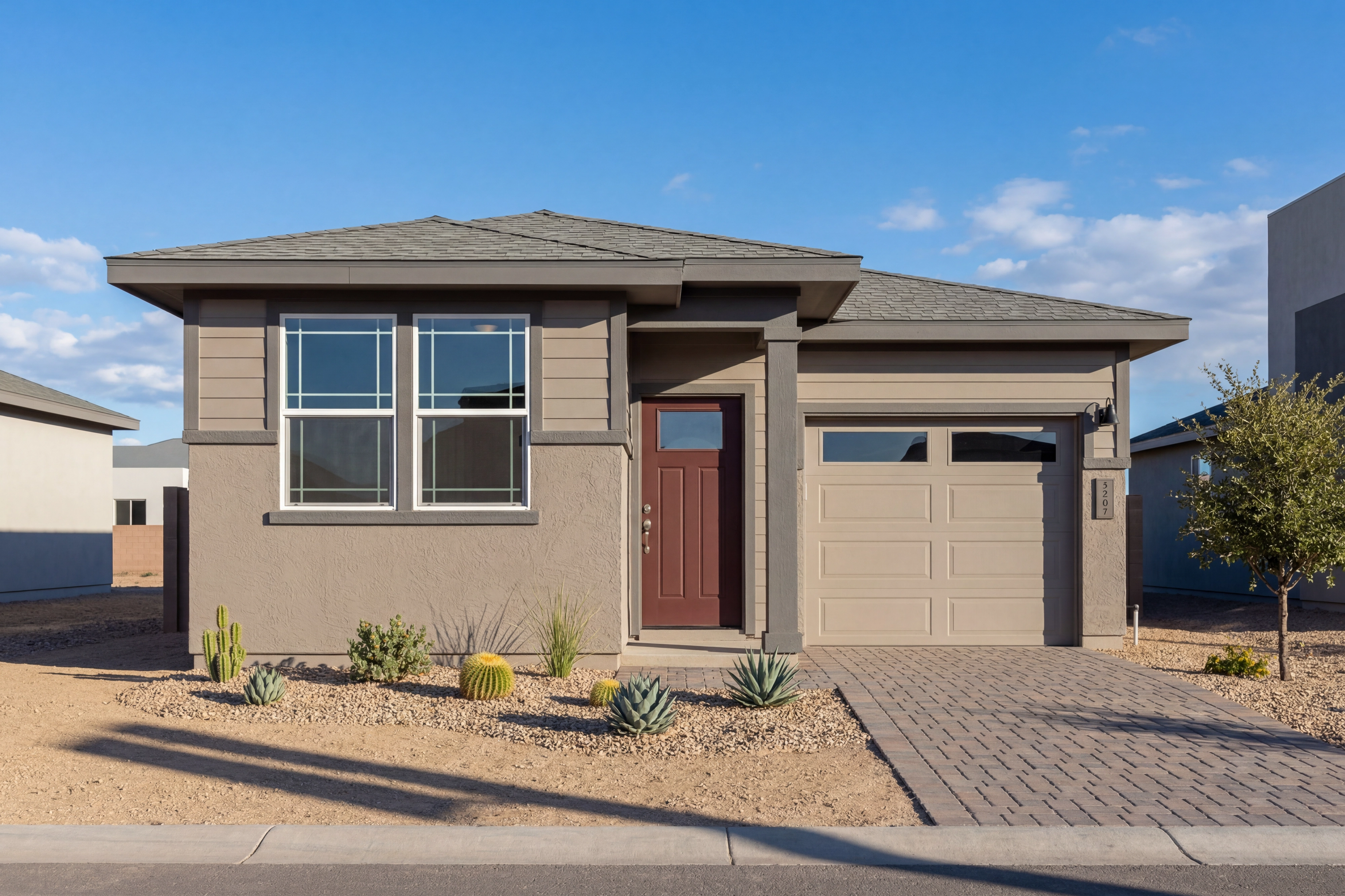Modern exterior elevation of The Richmond A in Prescott, Arizona, featuring a 1-story design with desert landscaping.