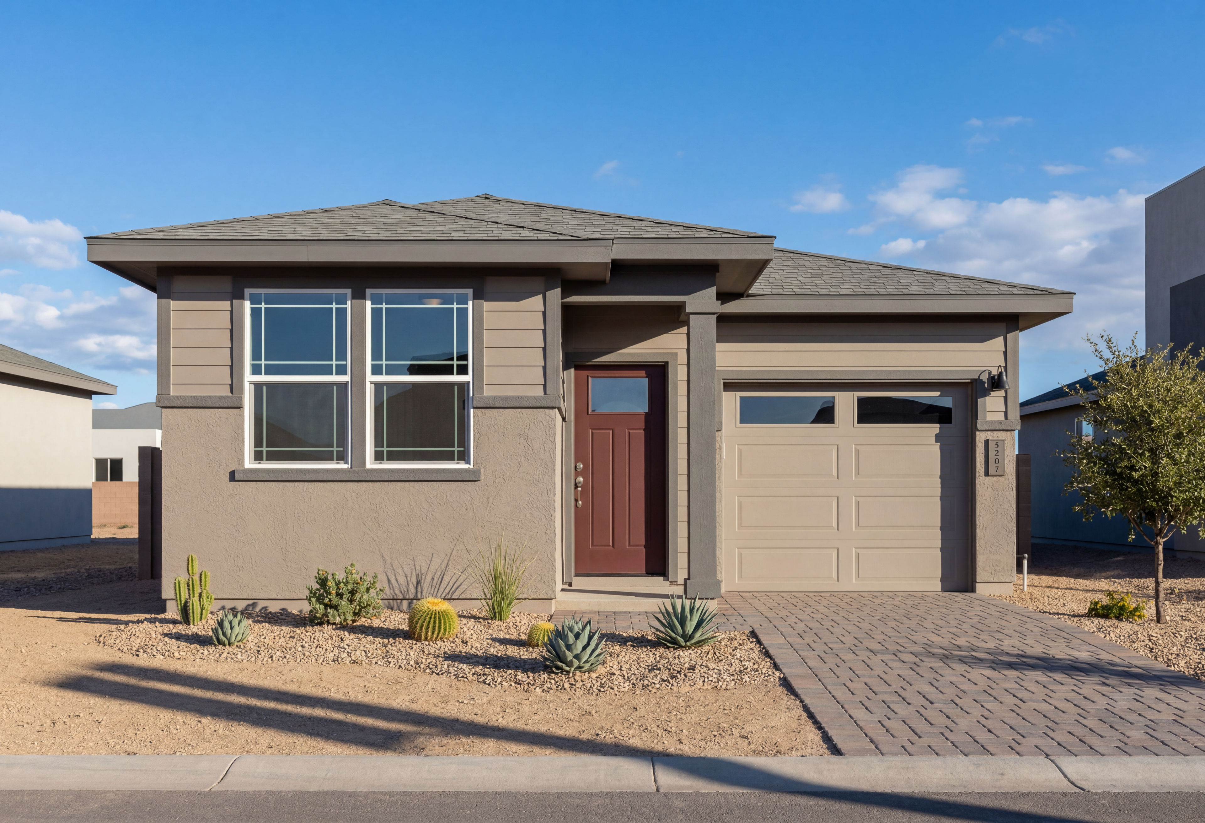 Modern exterior elevation of The Richmond A in Prescott, Arizona, featuring a 1-story design with desert landscaping.