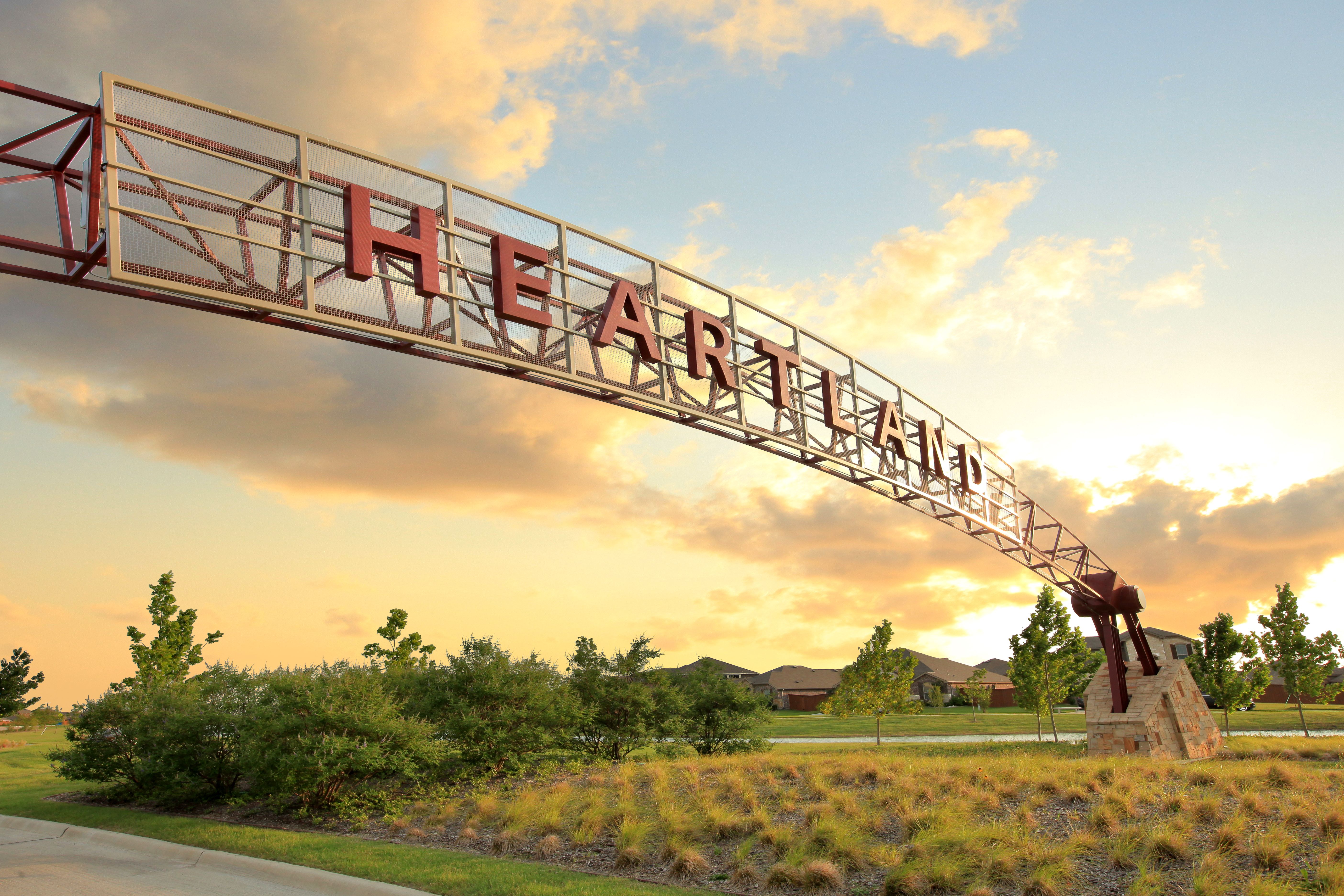 Heartland community entrance and lush landscaping