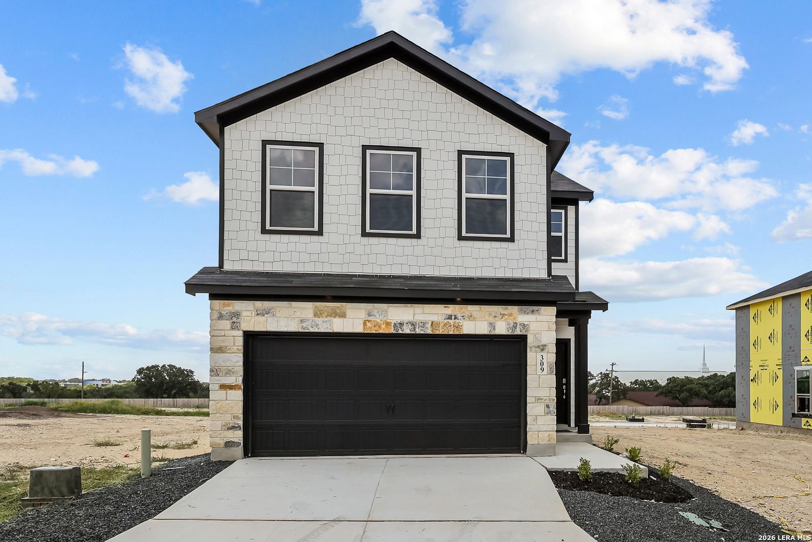 Two-story Gillian B floor plan by Davidson Homes with a 2-car garage in Meadows at Oak Creek, San Antonio, Texas.