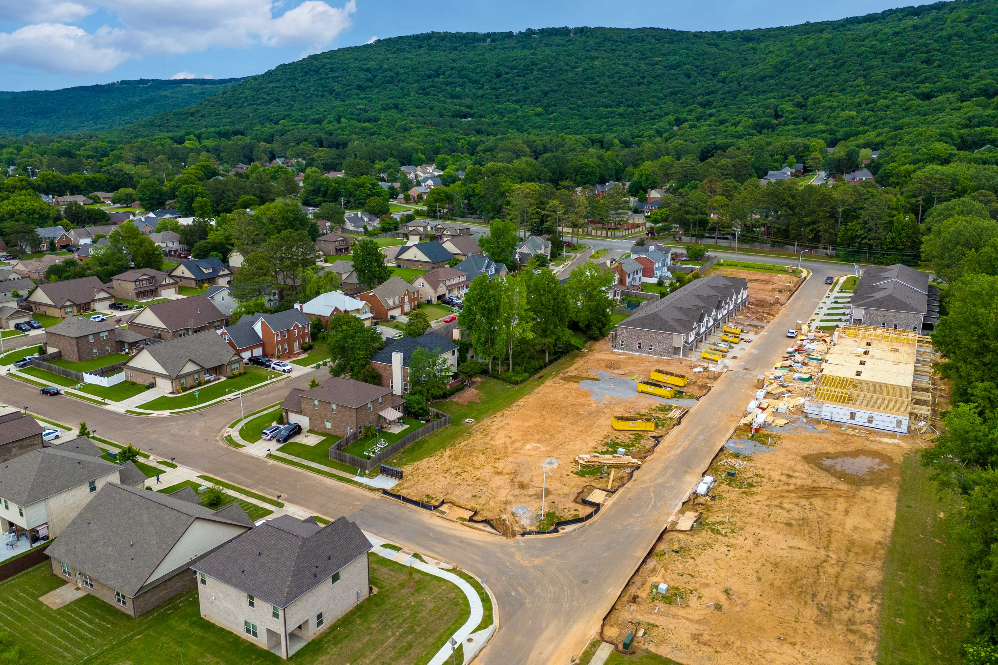 Aerial view of Pavilion Huntsville AL neighborhood with Davidson Homes under construction amid lush green hills