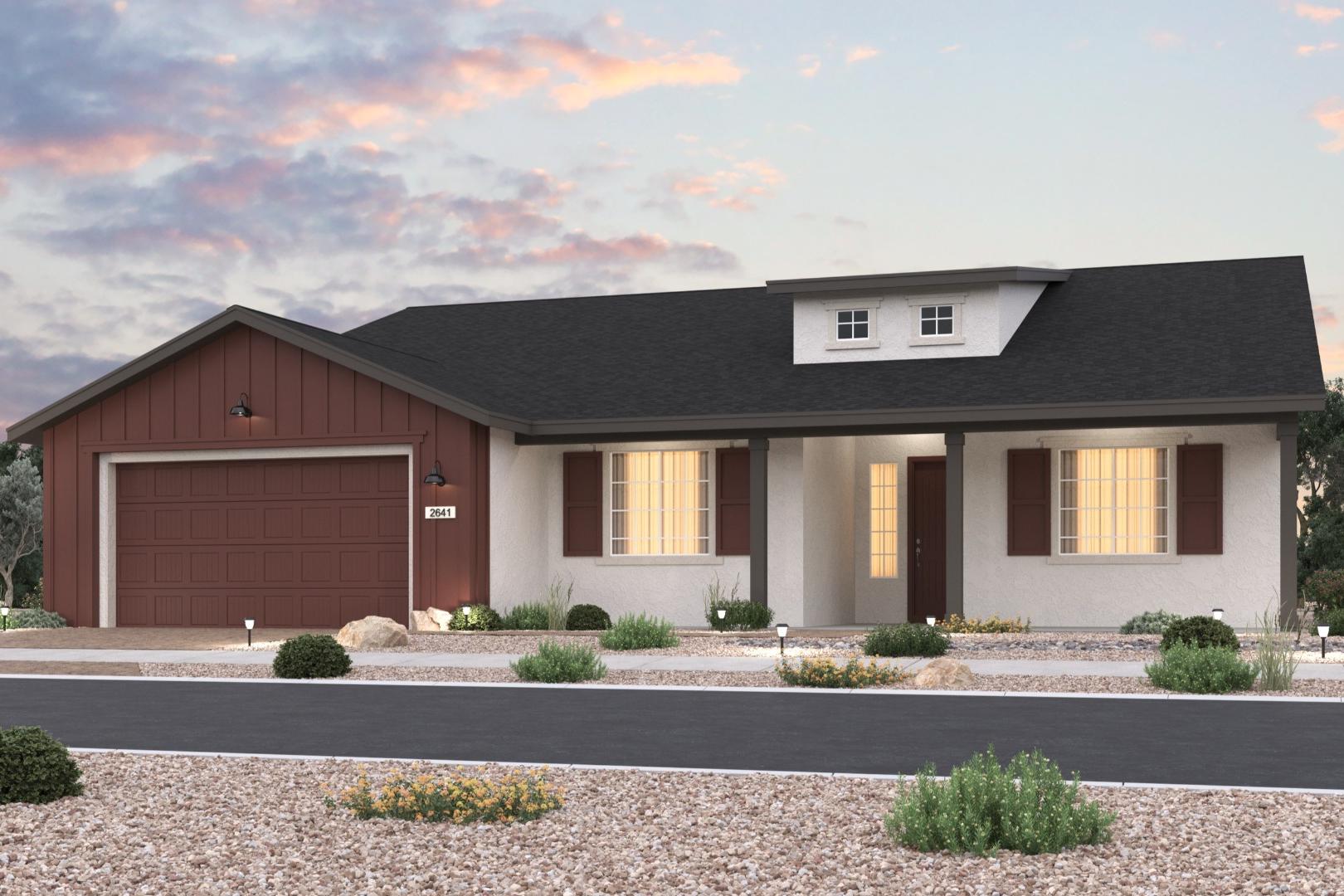 Single-story The Sunrise II E elevation featuring red garage door, stucco siding, black roof, and desert landscaping at sunset in Prescott, AZ