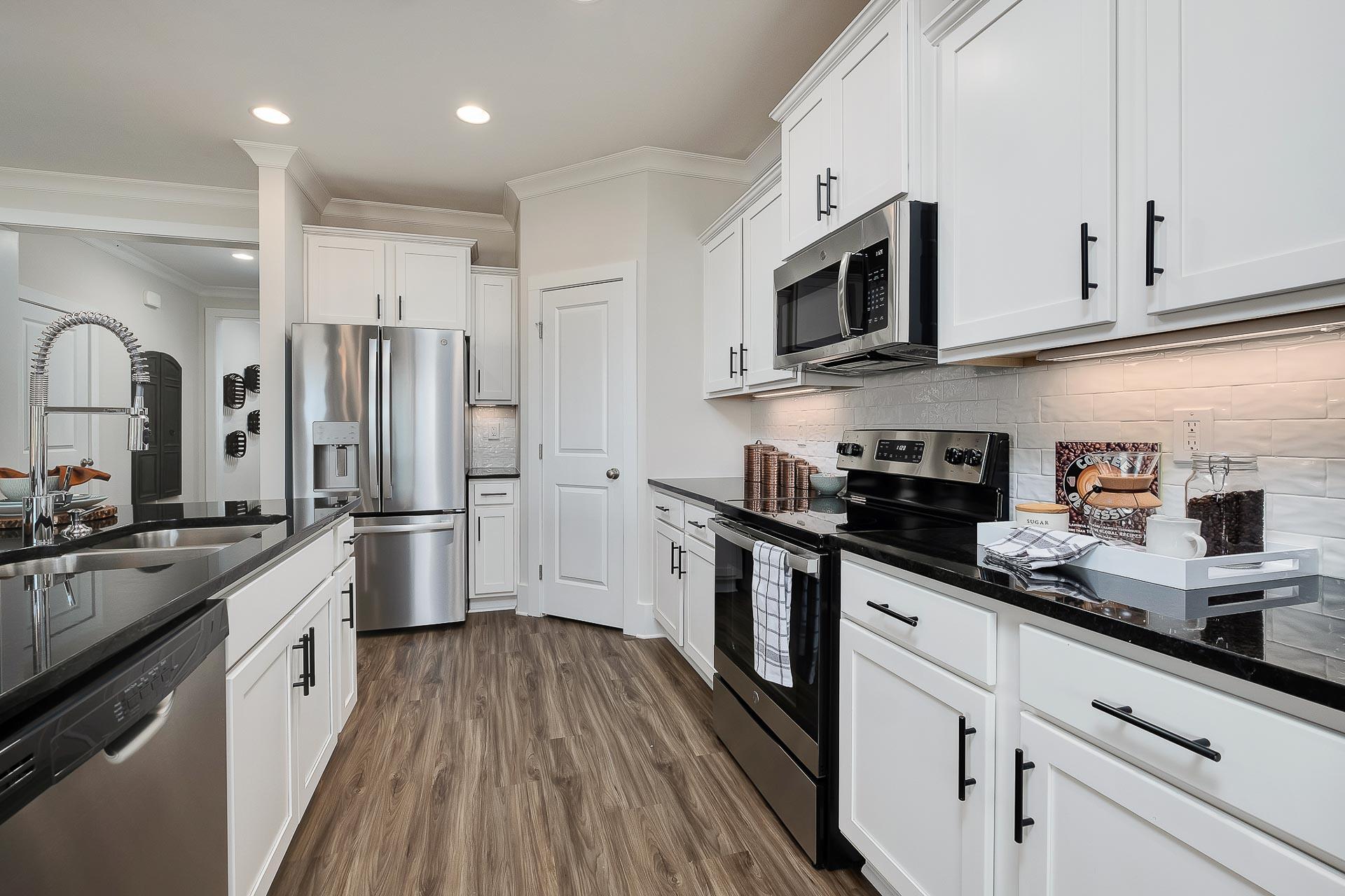 kitchen with white cabinets