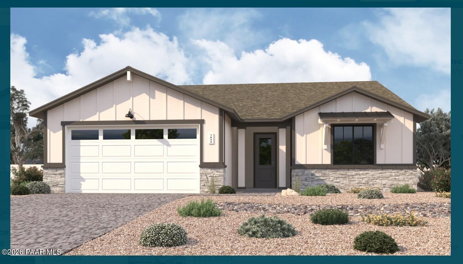 Modern beige single-story home with 3-car garage, stone accents, desert landscaping in South Ranch, Prescott AZ - Durango II G