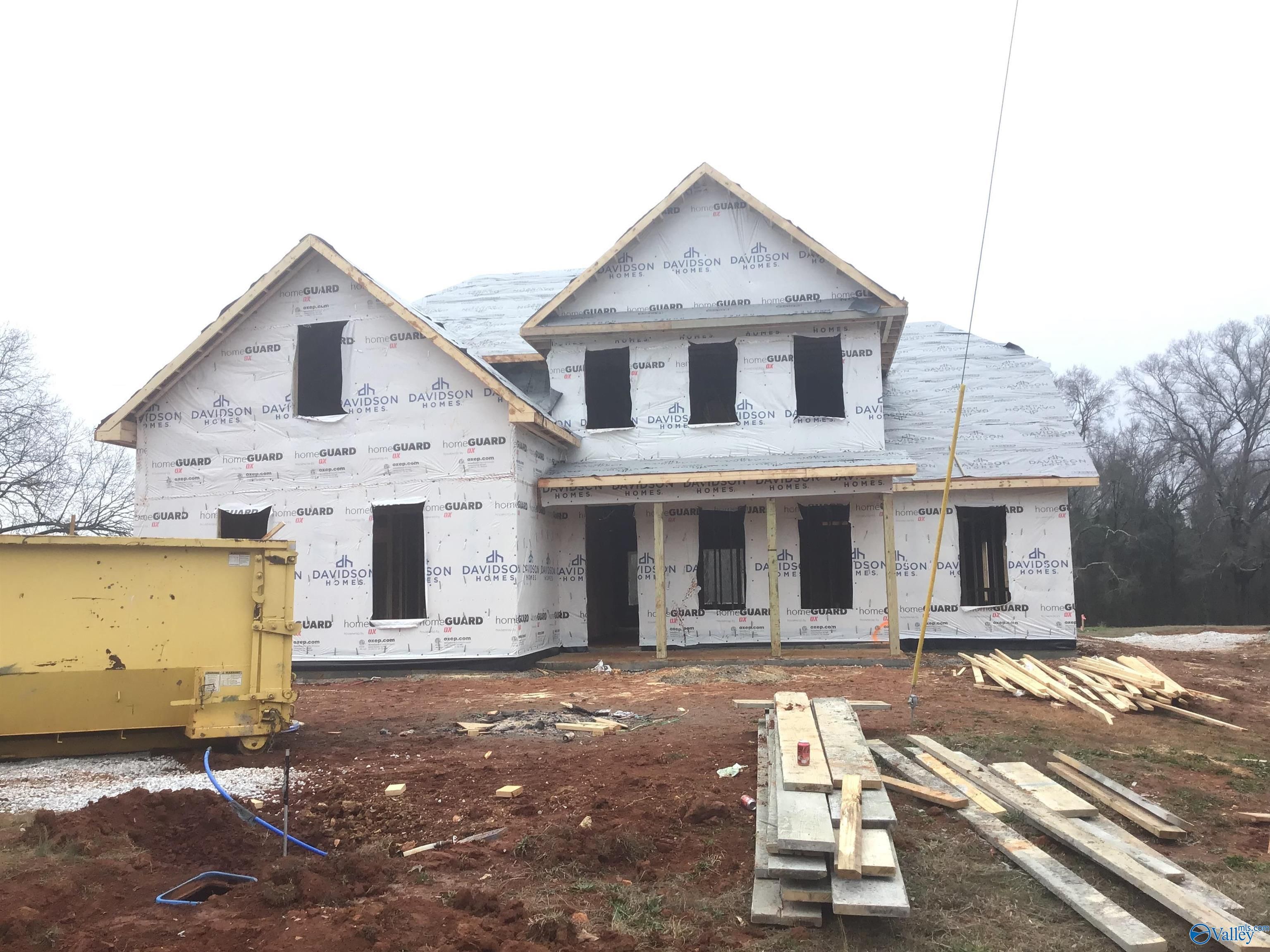 Two-story Emory floor plan home under construction by Davidson Homes in Hollon Meadow, Decatur, Alabama, with gabled roof and front porch