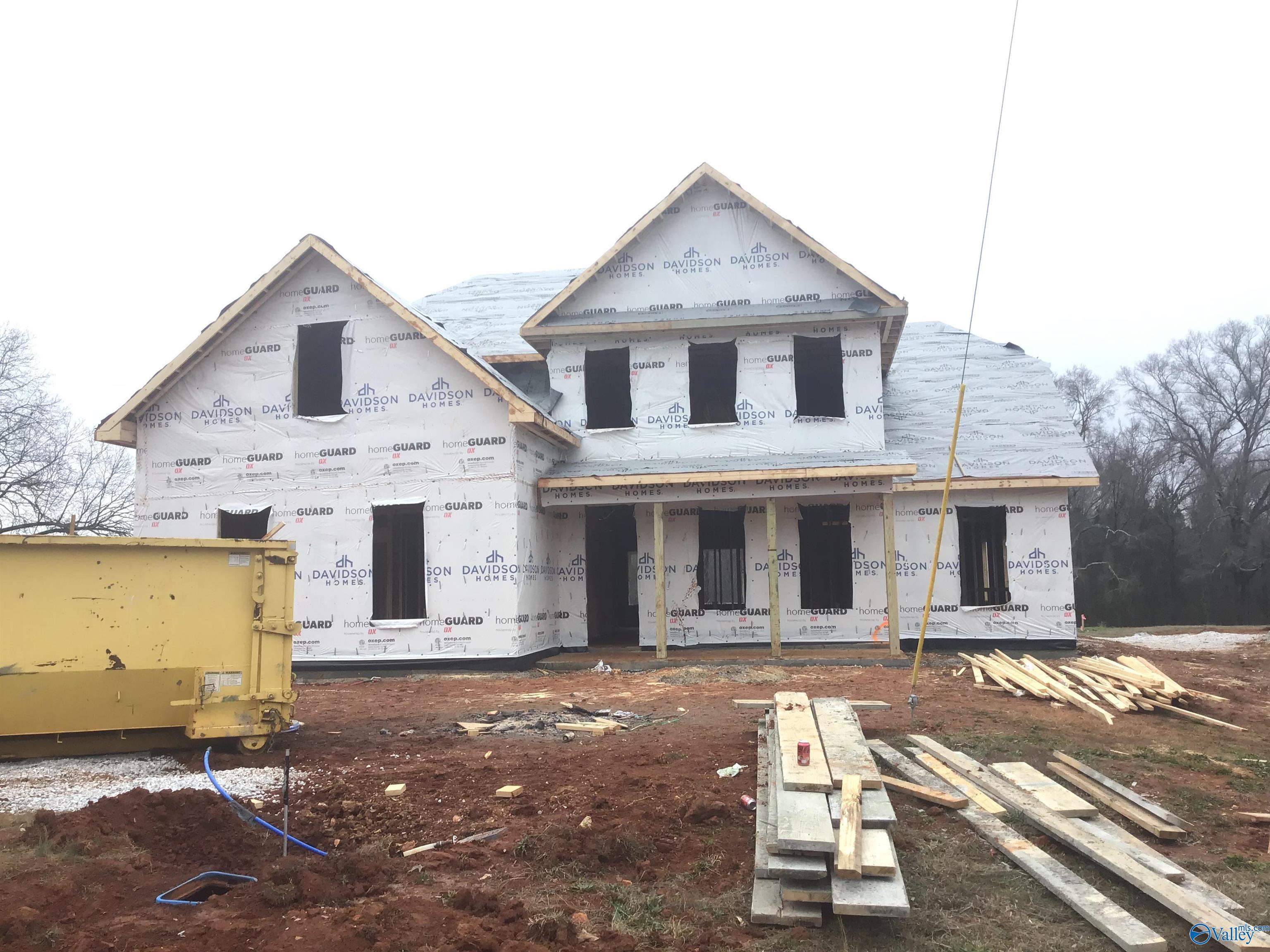 Two-story Emory floor plan home under construction by Davidson Homes in Hollon Meadow, Decatur, Alabama, with gabled roof and front porch