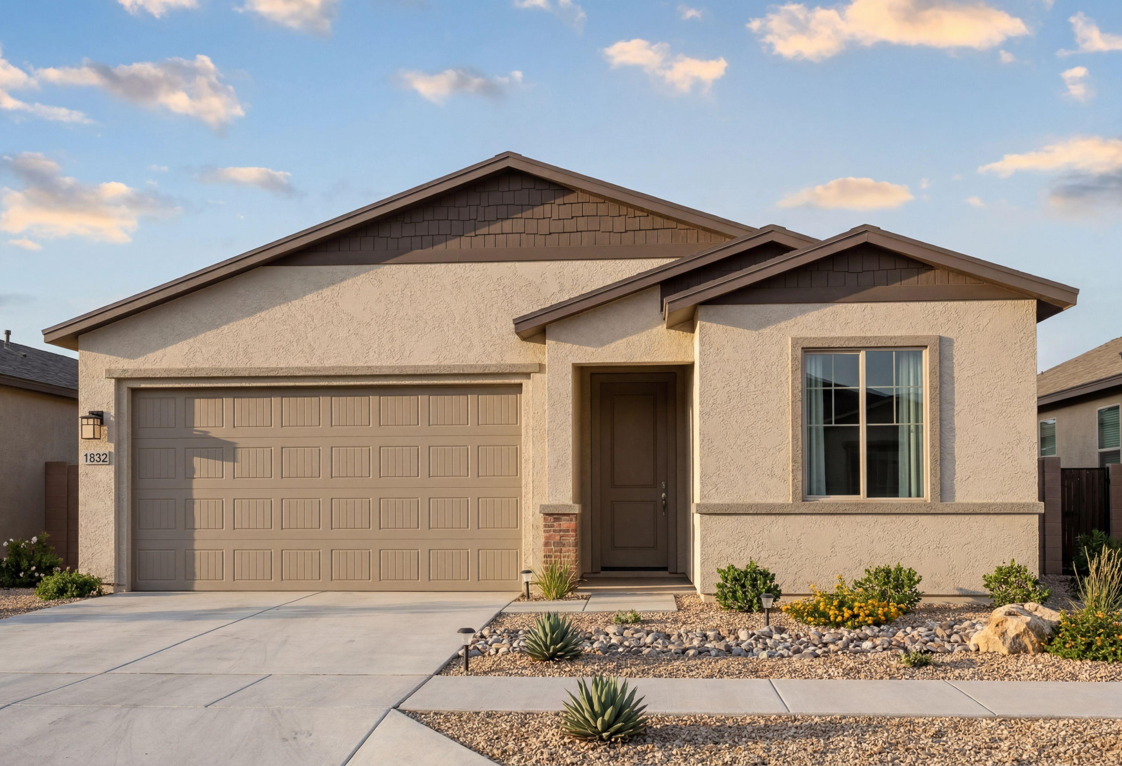 The Frontier single-family home in Prescott Valley features a 1-story stucco exterior and spacious 3-car garage.