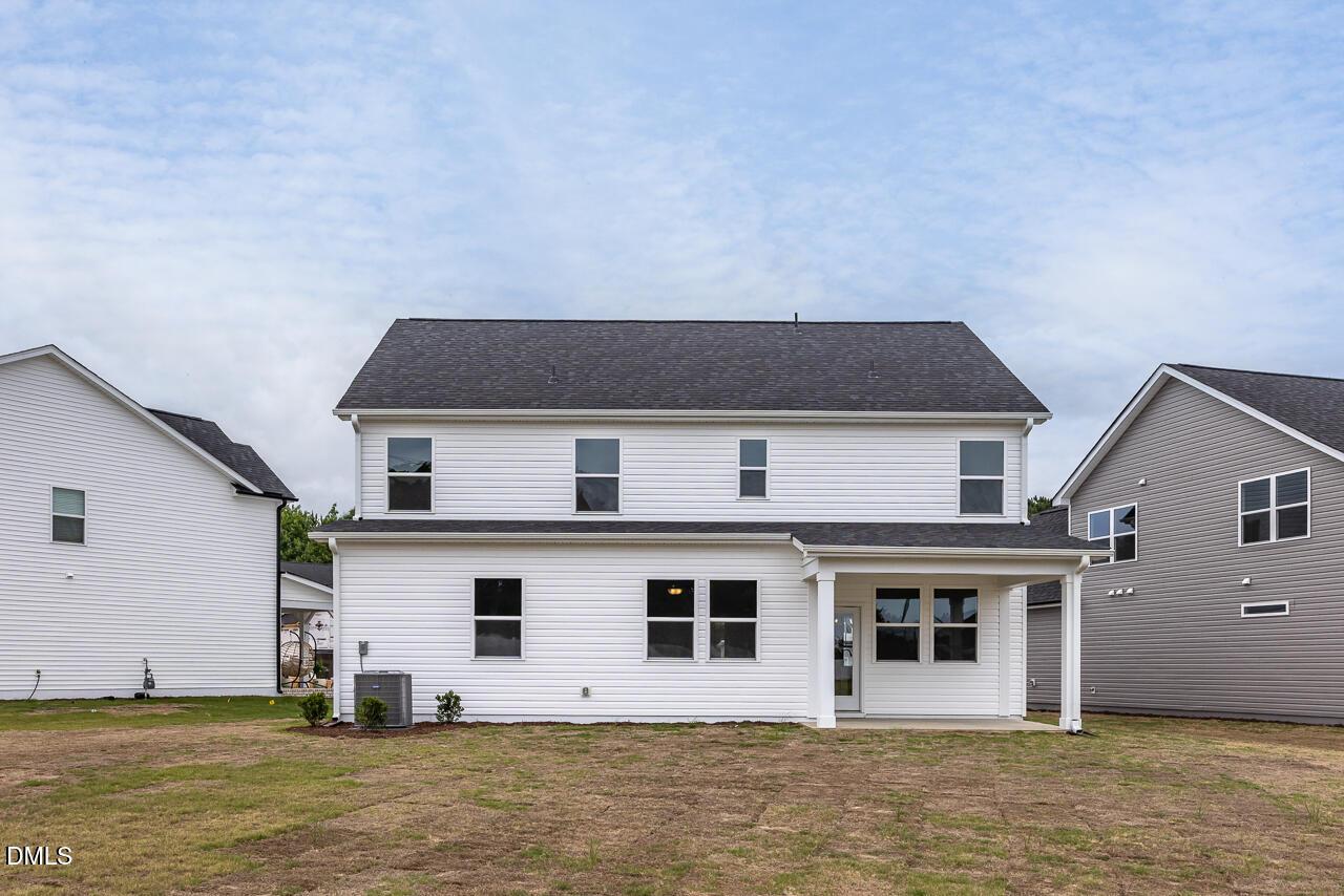 Rear exterior view of The Willow B floor plan by Davidson Homes in Woodland Crossing, Zebulon, North Carolina.