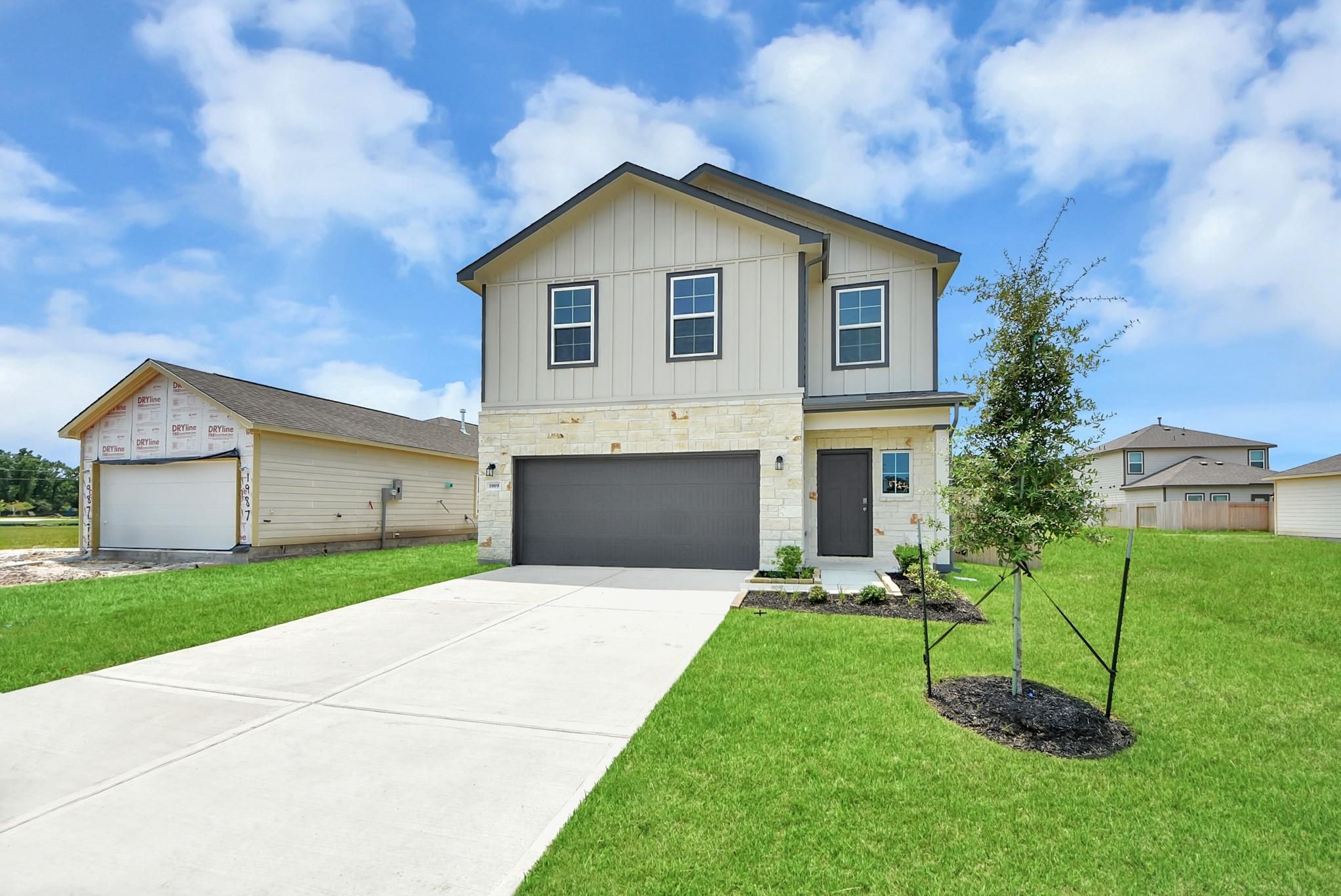Two-story, 4-bedroom Blanco E floor plan by Davidson Homes with a 2-car garage in The Villages at WestPointe, Dayton, Texas.