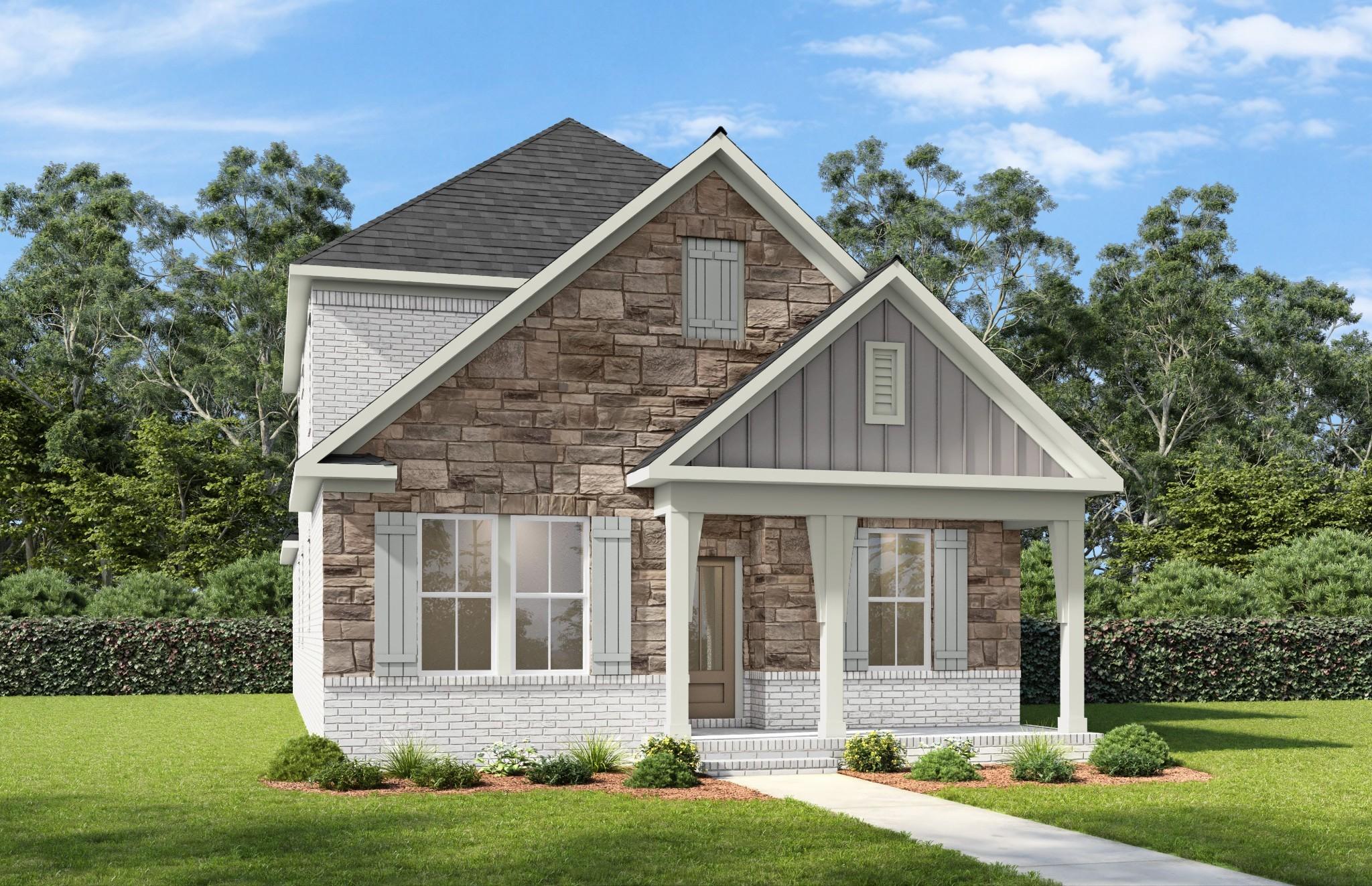 Front exterior of Davidson Homes' The Fairmont C, 3-bedroom 2-story home with stone and white brick facade in Bradshaw Farms, Mt. Juliet, Tennessee