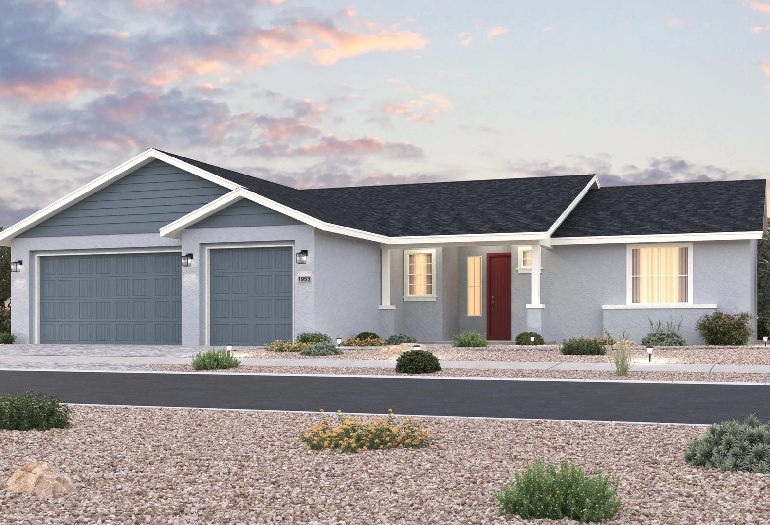 The Daybreak single-story home elevation in Prescott AZ: gray siding, gabled roof, 3-car garage, desert landscaping at sunset