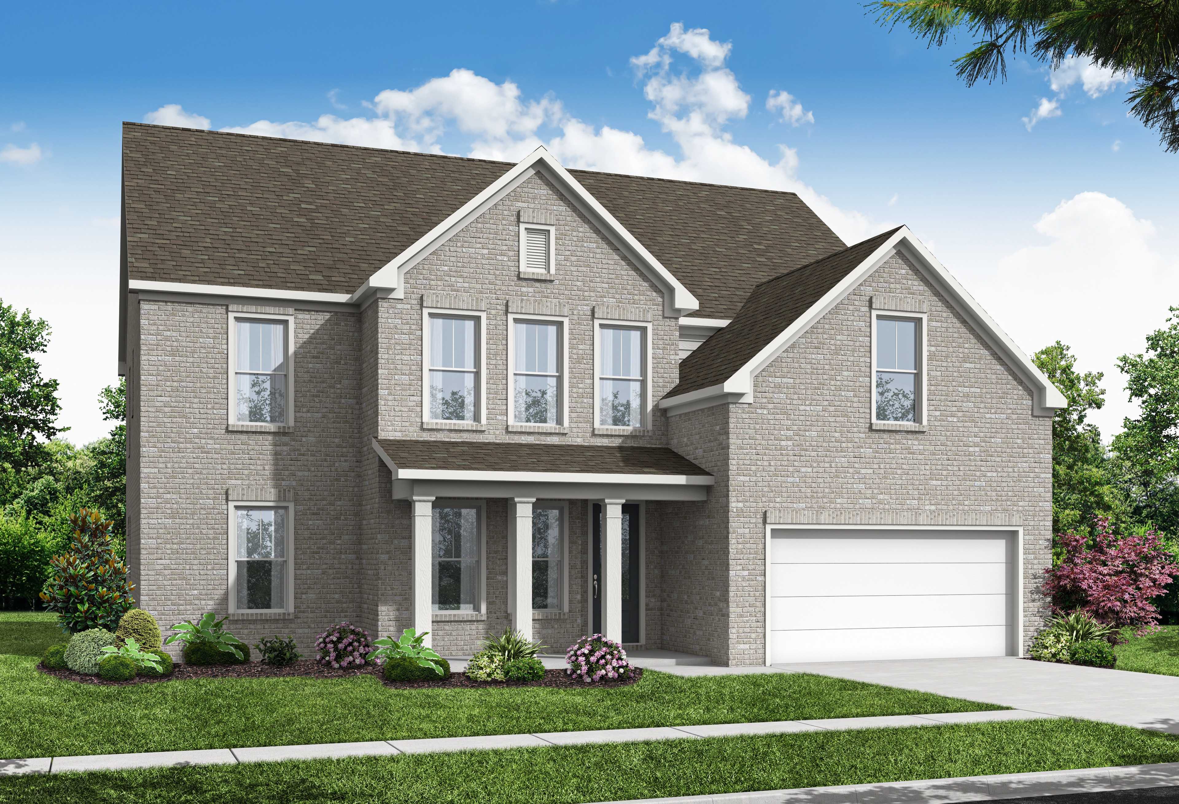 Two-story brick facade of The Hampton home design by Davidson Homes in Buford, GA, with gabled roof, columned porch, and two-car garage