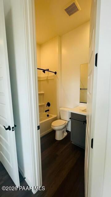 Modern bathroom with shower-tub combo and dark vanity in The Aurea C floor plan at Hidden Hills, Prescott, Arizona.