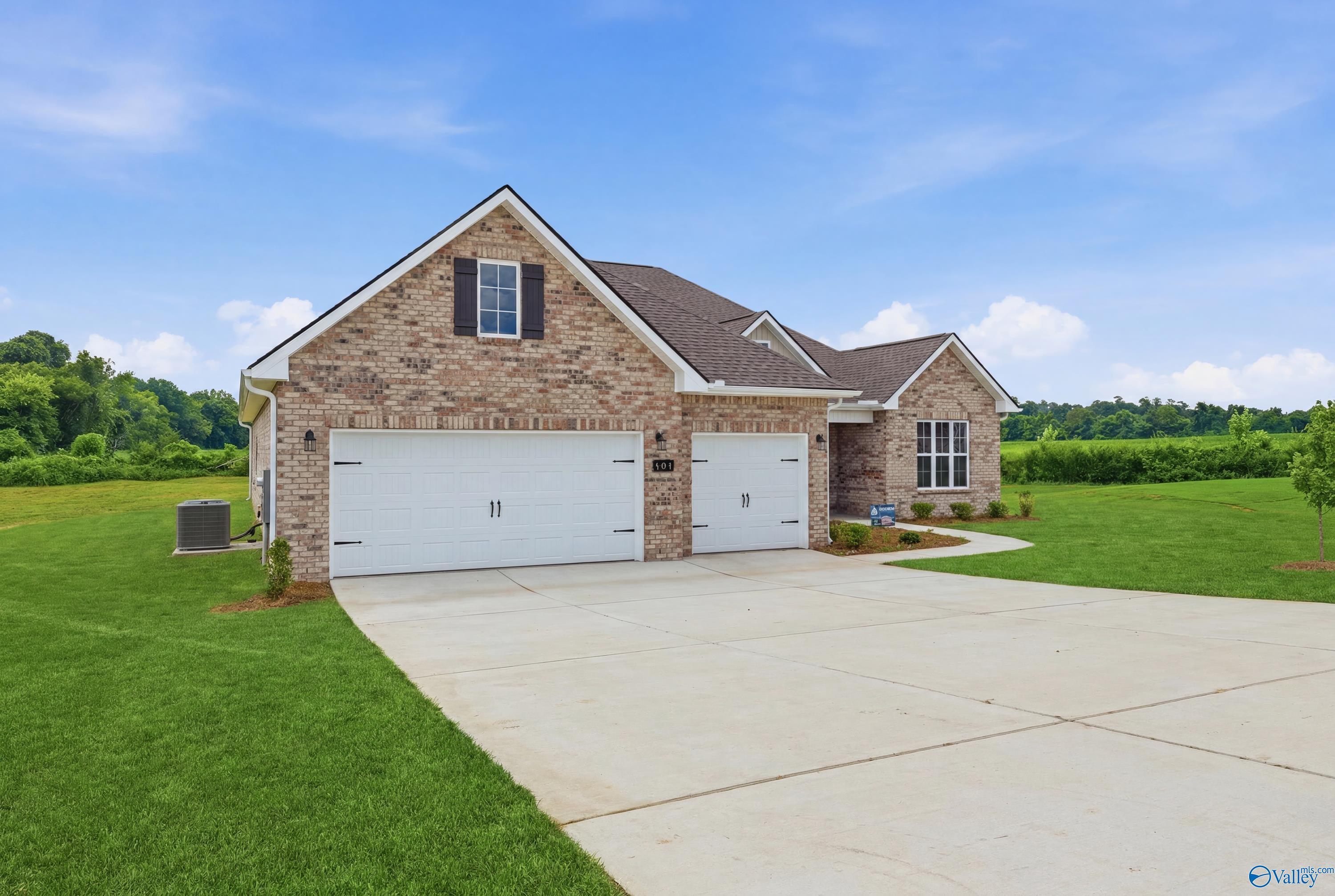 The Finleigh floor plan by Davidson Homes, a 1-story brick house with a 3-car garage in Riverton Preserve, Huntsville, AL.