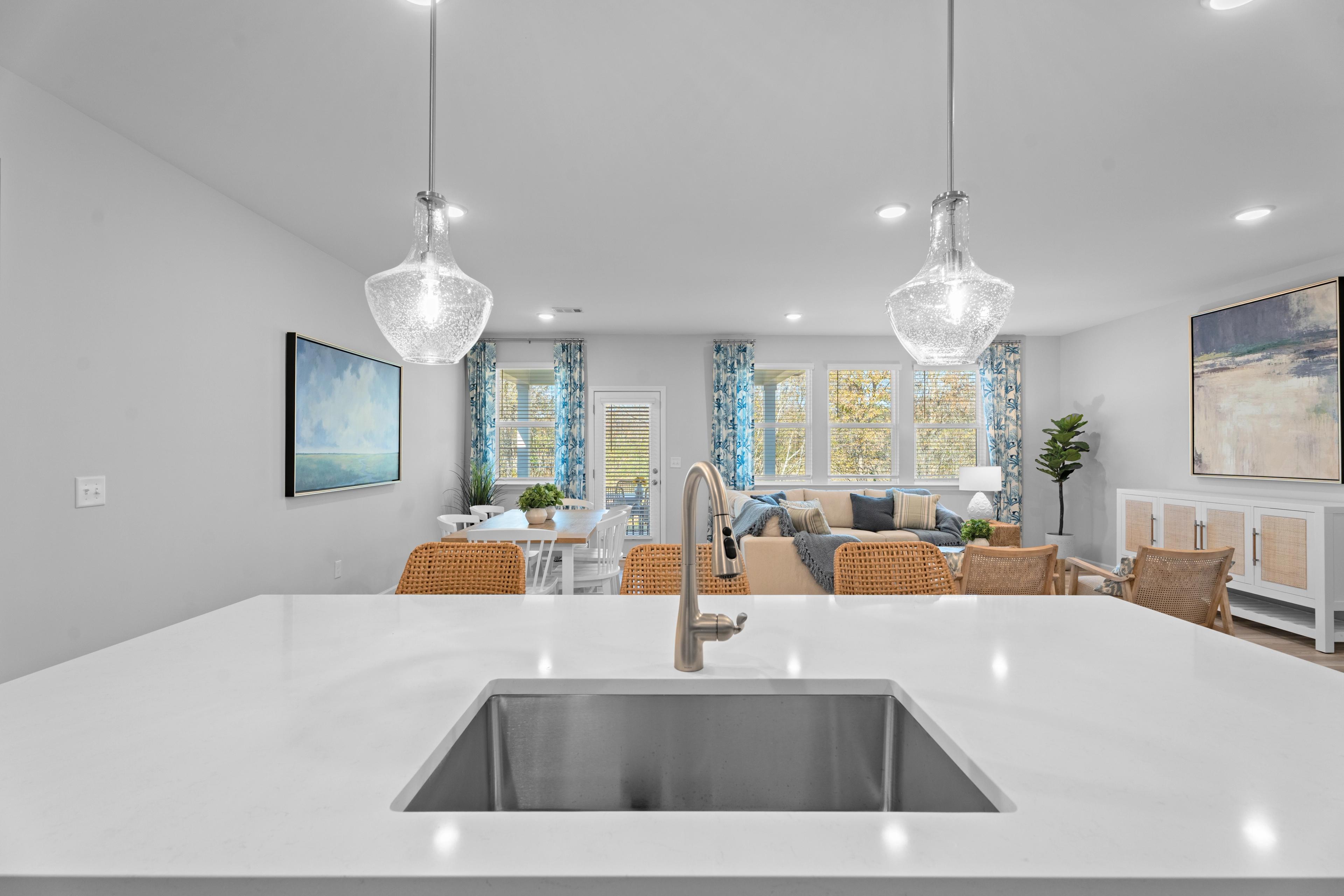 Open concept kitchen, living, and dining rooms