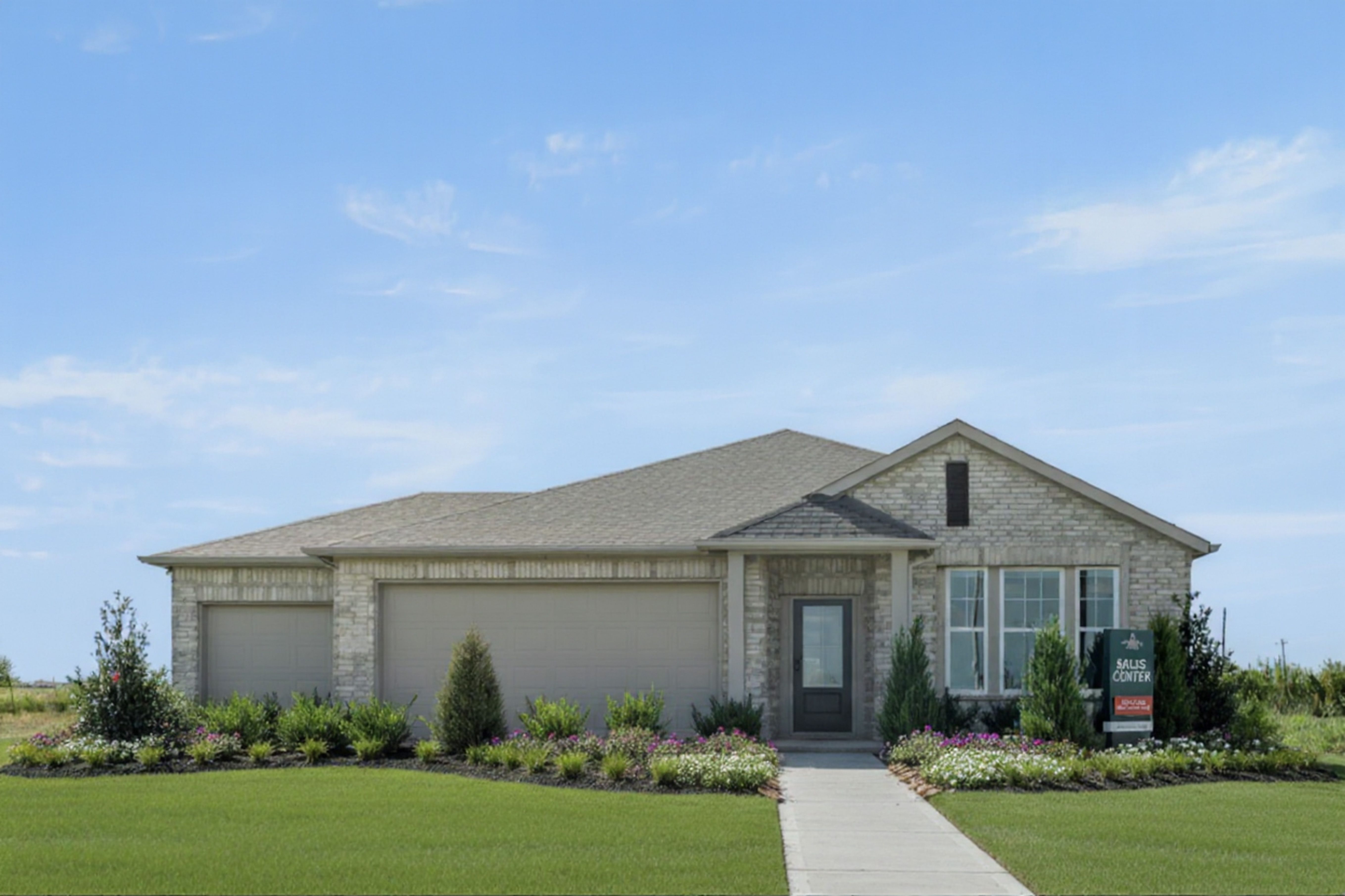 single-story home with 3-car garage, brick exterior