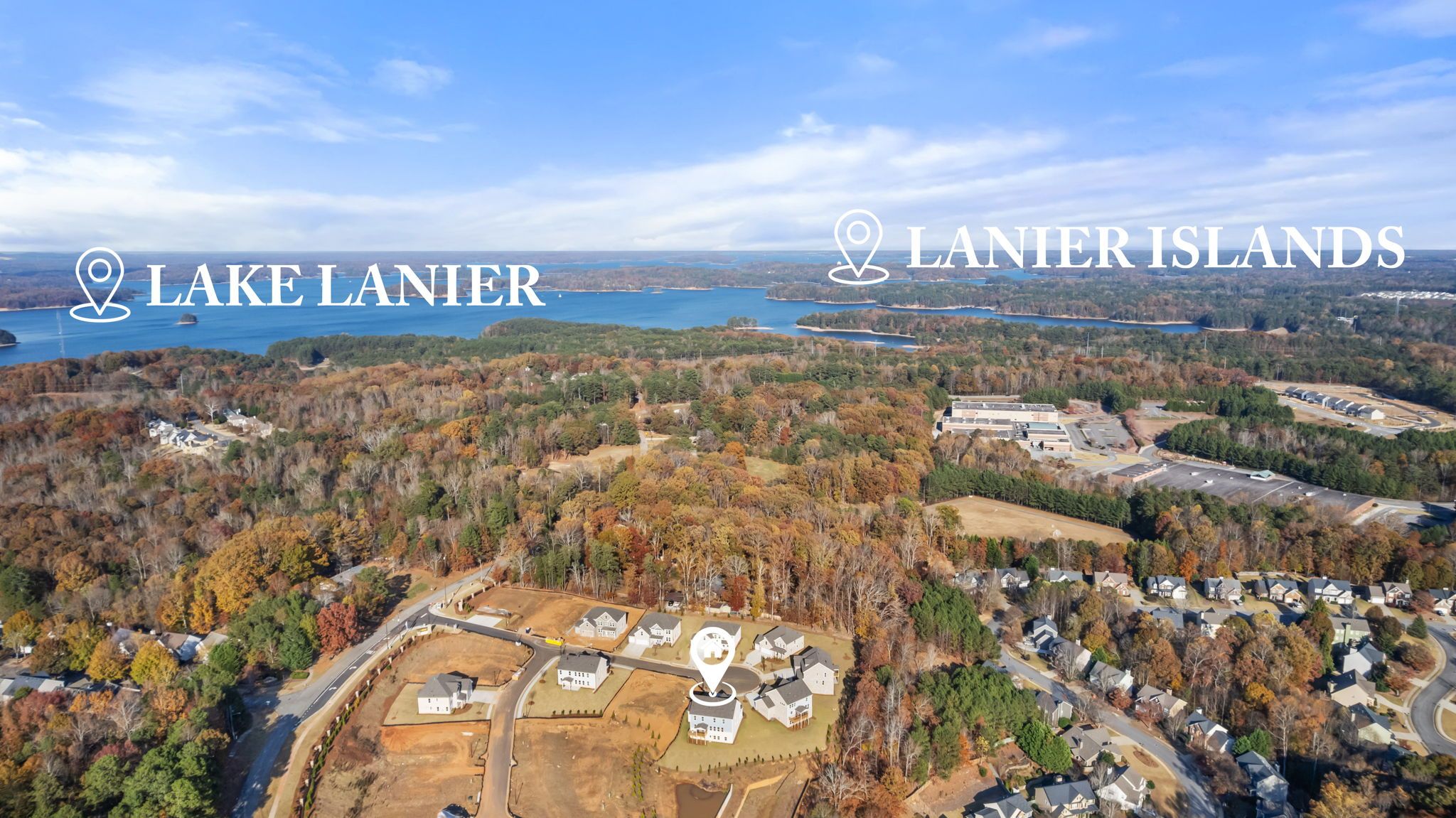 Aerial view of Melody Lakeside Estates in Buford GA near Lake Lanier and Lanier Islands with fall foliage and new homes