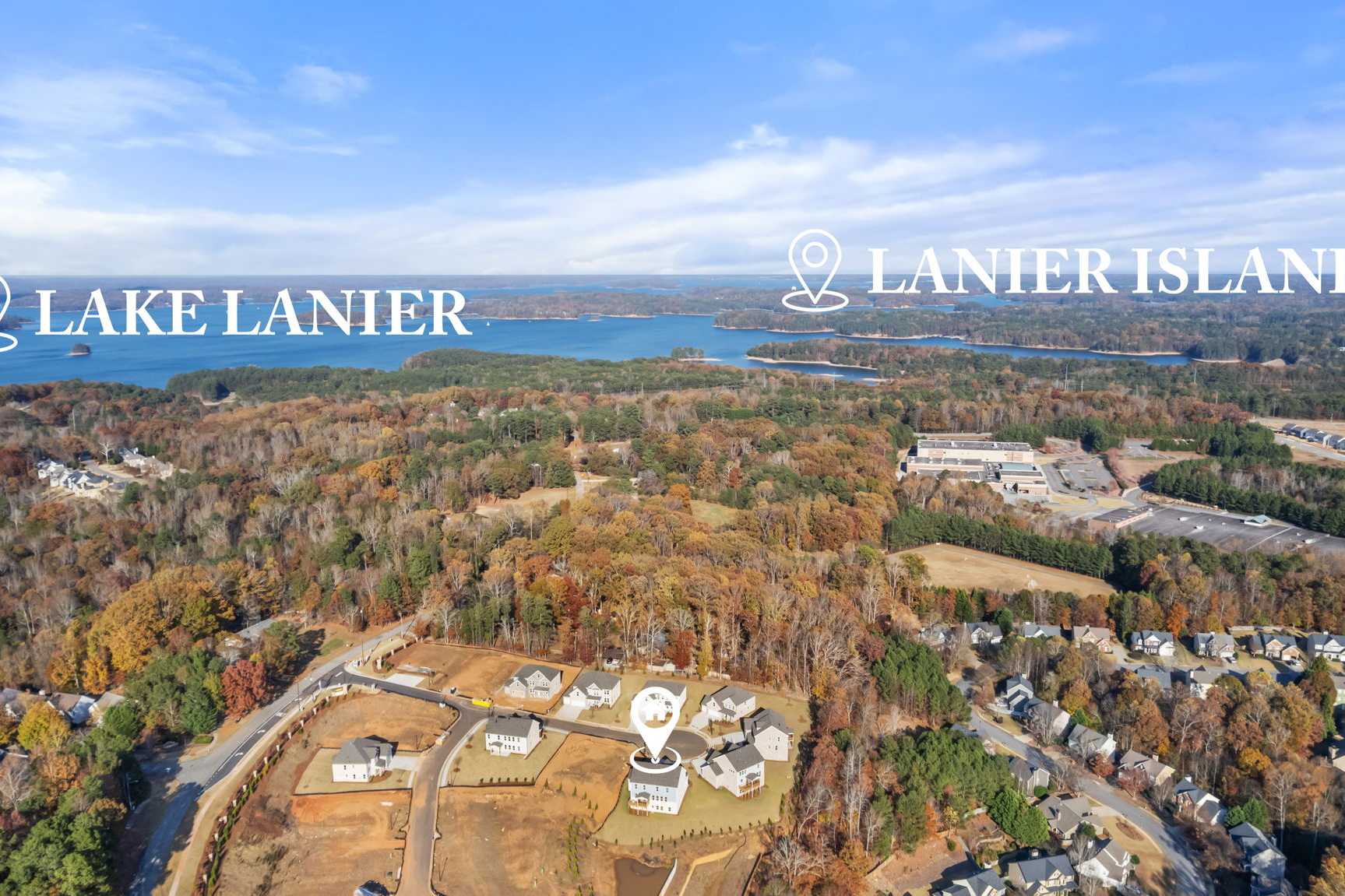 Aerial view of Melody Lakeside Estates in Buford GA near Lake Lanier and Lanier Islands with fall foliage and new homes