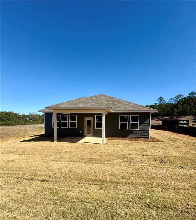Single-story gray 4-bedroom Luna B home with covered front porch and garage in Anderson Lakes, Opelika, Alabama
