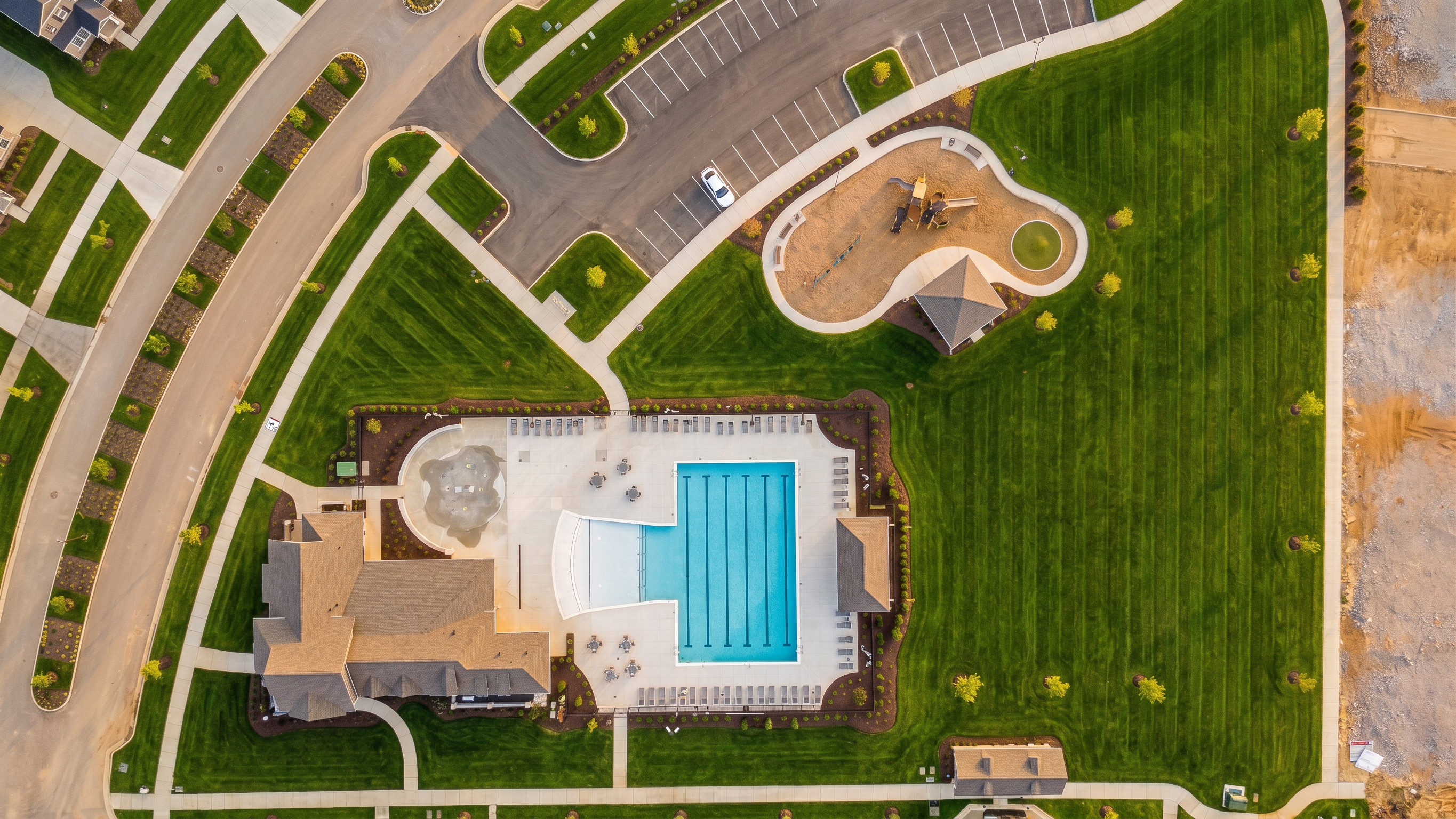 Aerial view of community swimming pool and playground at Bradshaw Farms in Mt. Juliet, TN by Davidson Homes.