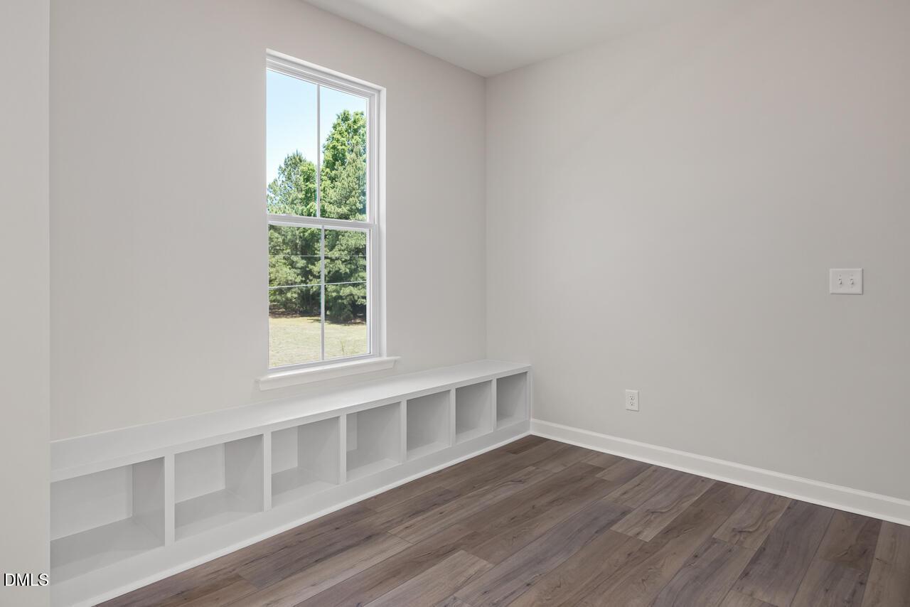 Built-in storage cubbies beneath a sunny window in The Mitchell Interior floor plan at Camden Park, Knightdale, NC.