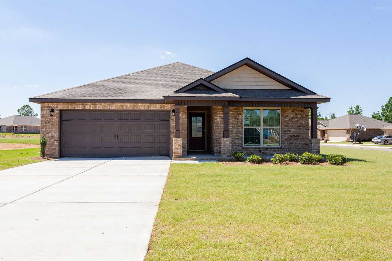 Davidson Homes The Daphne Floor Plan Front Exterior with driveway, garage, and front yard