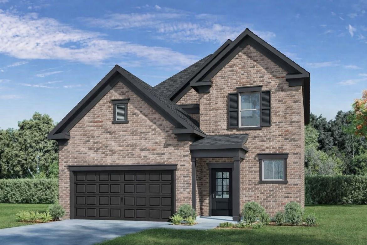 Two-story brick home with black shutters, 2-car garage, Davidson Homes Verano B in Sunterra, Katy, Texas