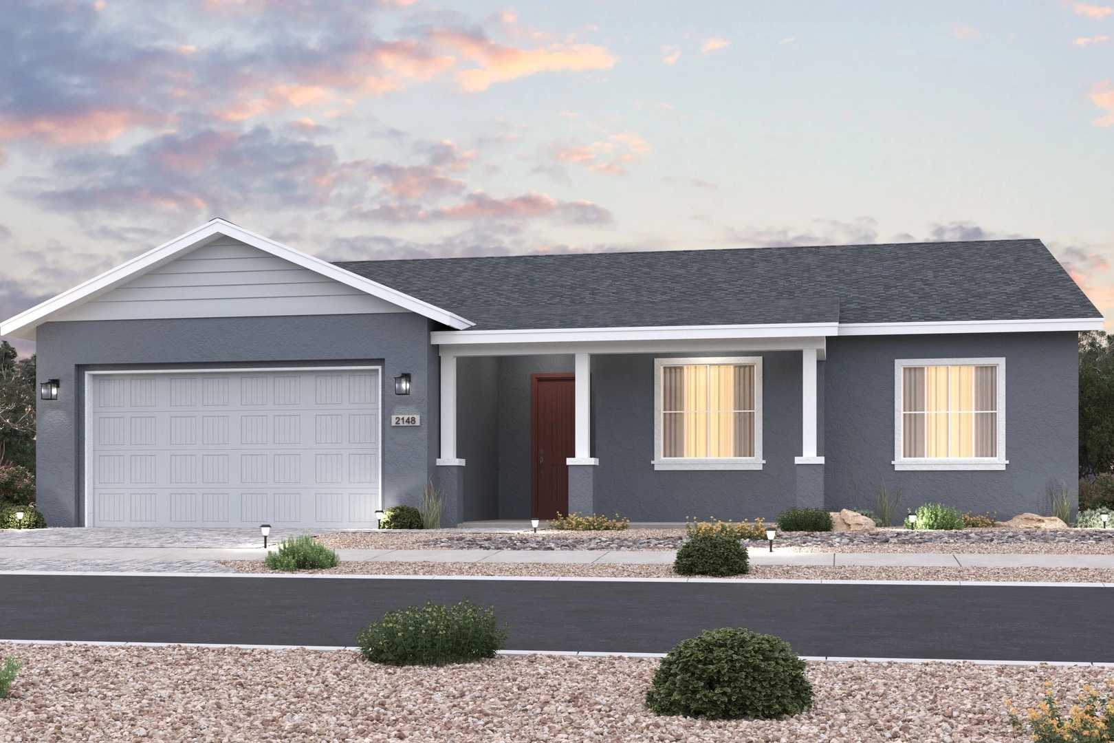 Stylish single-story The Summit A elevation by Evermore Homes, gray siding, covered porch, 3-car garage, desert landscape in Prescott Valley Arizona