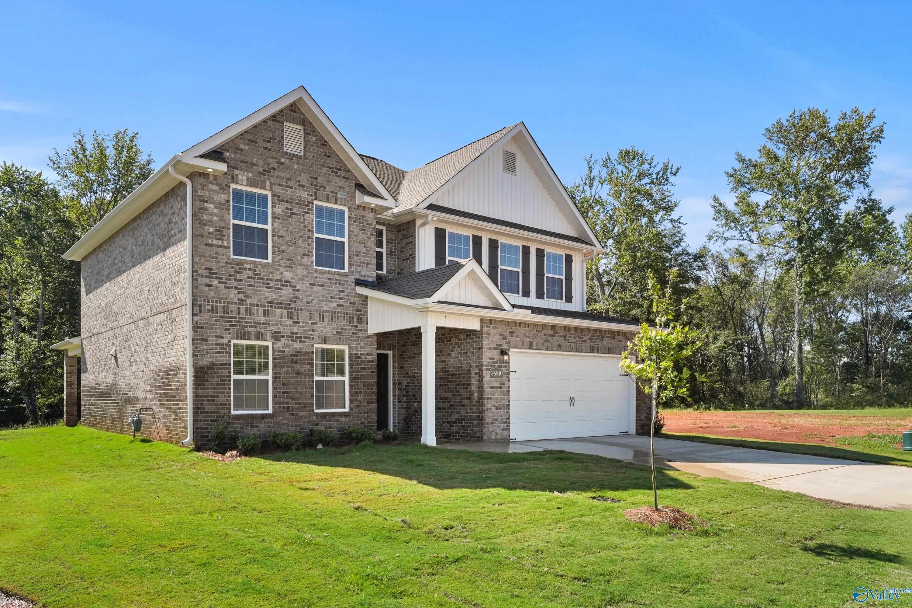 Two-story brick home with 2-car garage and covered porch in Ricketts Farm, Athens, Alabama - Davidson Homes Shelby A