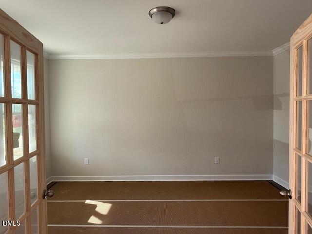 French doors opening into a bright flex room or office space in The Hickory II B floor plan, Montrose, Aberdeen, NC.