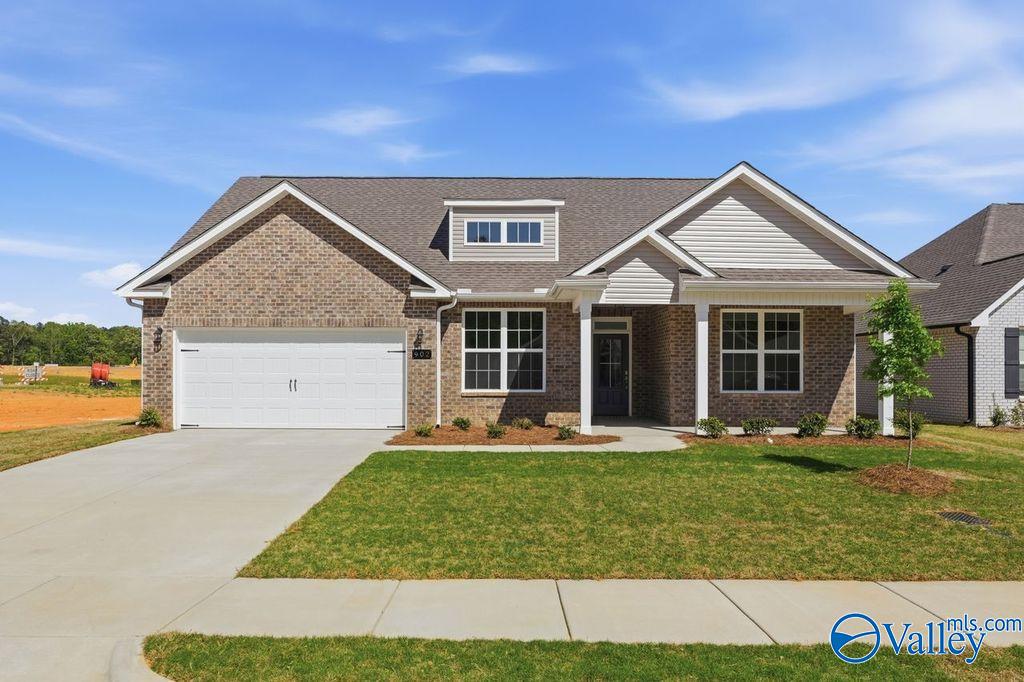Brick single-story home with 2-car garage, gabled roof, and covered porch in Cain Park, Hartselle, Alabama - Davidson Homes Harrison