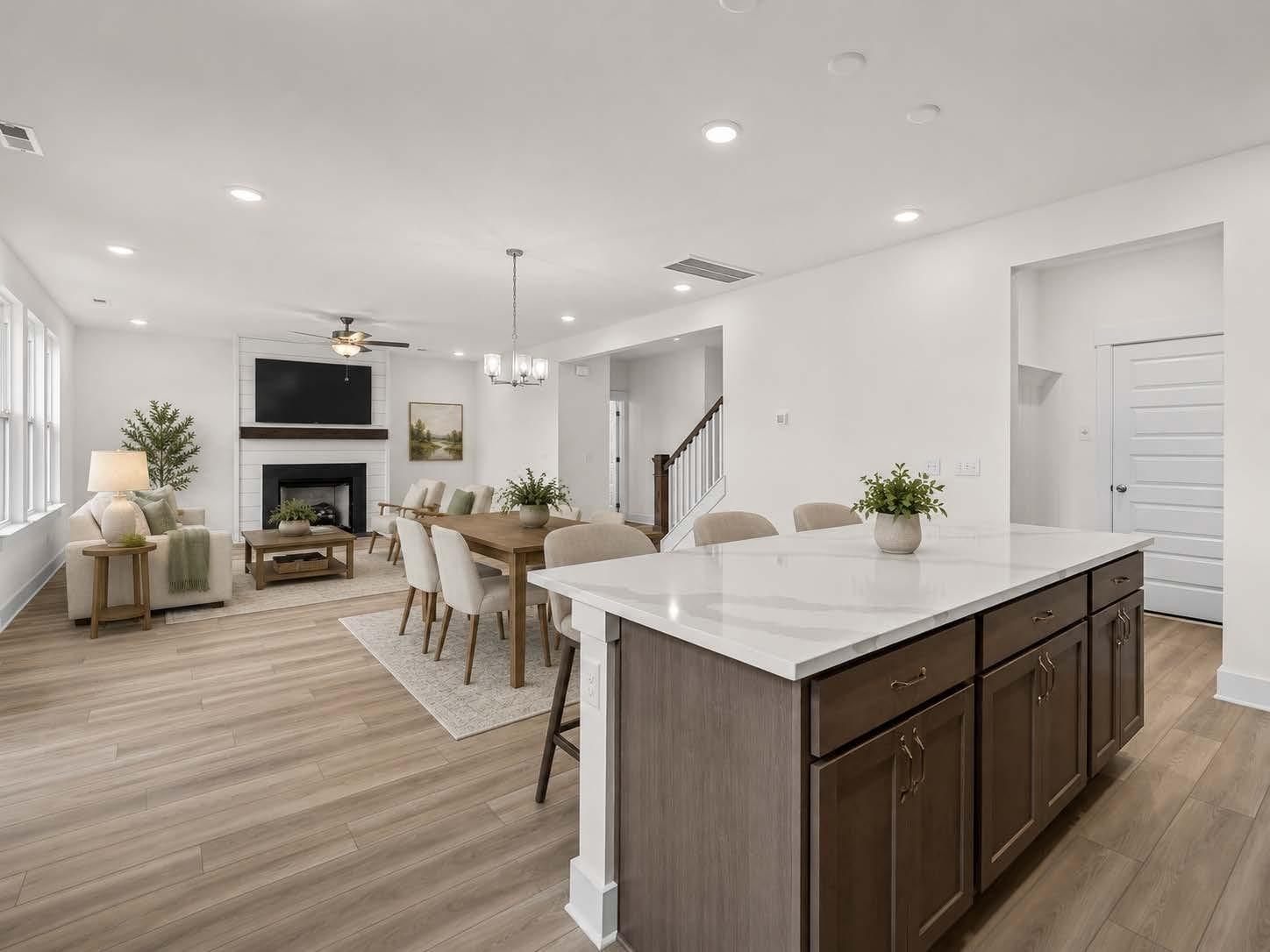 Open-concept kitchen and living area in The Henry C floor plan by Davidson Homes in Benders Cove, Mt. Juliet, Tennessee.
