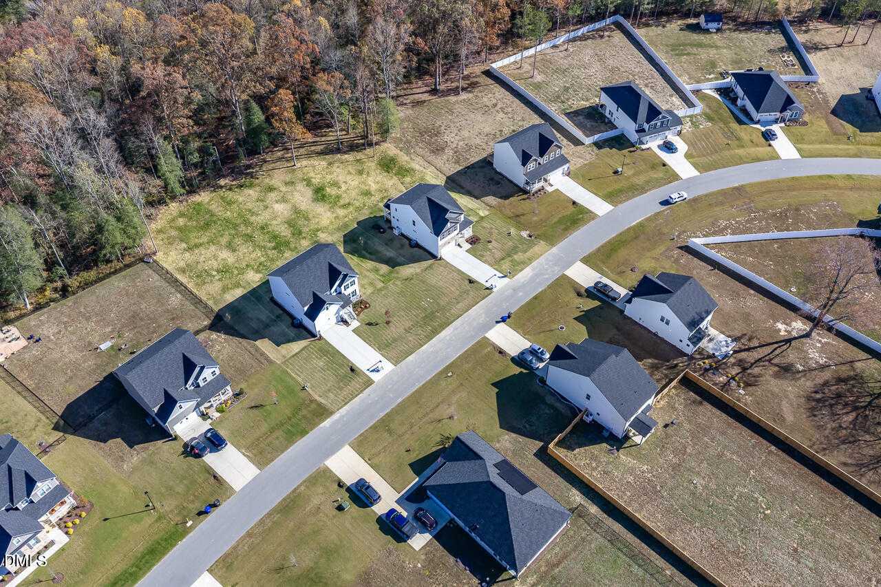 Aerial view of modern 2-story homes with 2-car garages in Wellers Knoll, Lillington, North Carolina by Davidson Homes