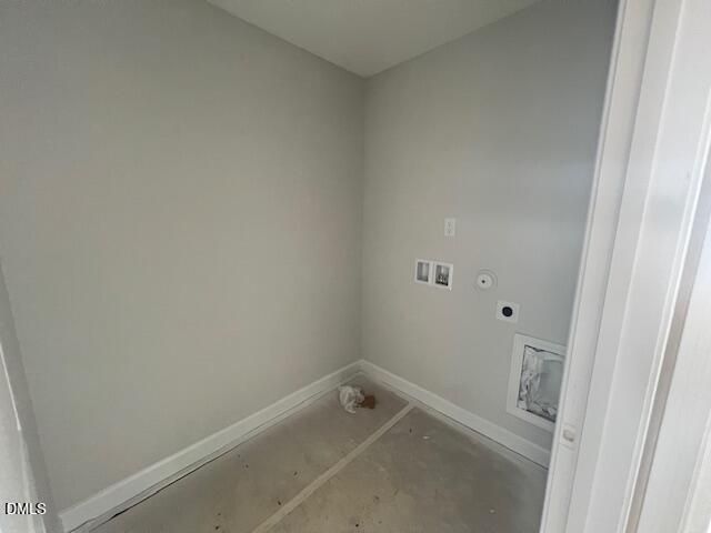 Spacious laundry room with washer dryer hookups, light gray walls in Davidson Homes Adalynn B, Lillington NC