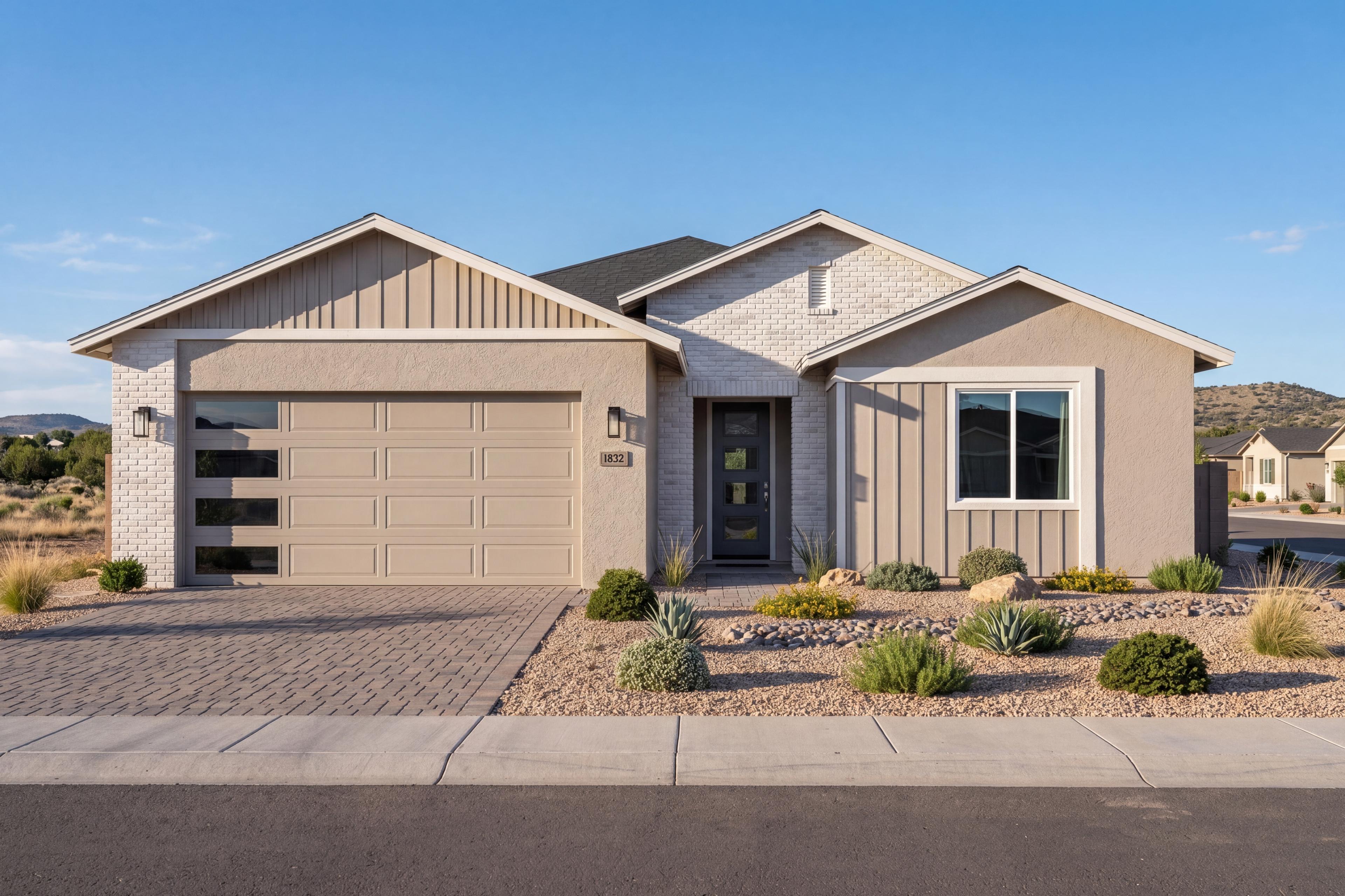 The Durango II H single-family home in Prescott, Arizona featuring a 3-car garage and modern desert landscaping.